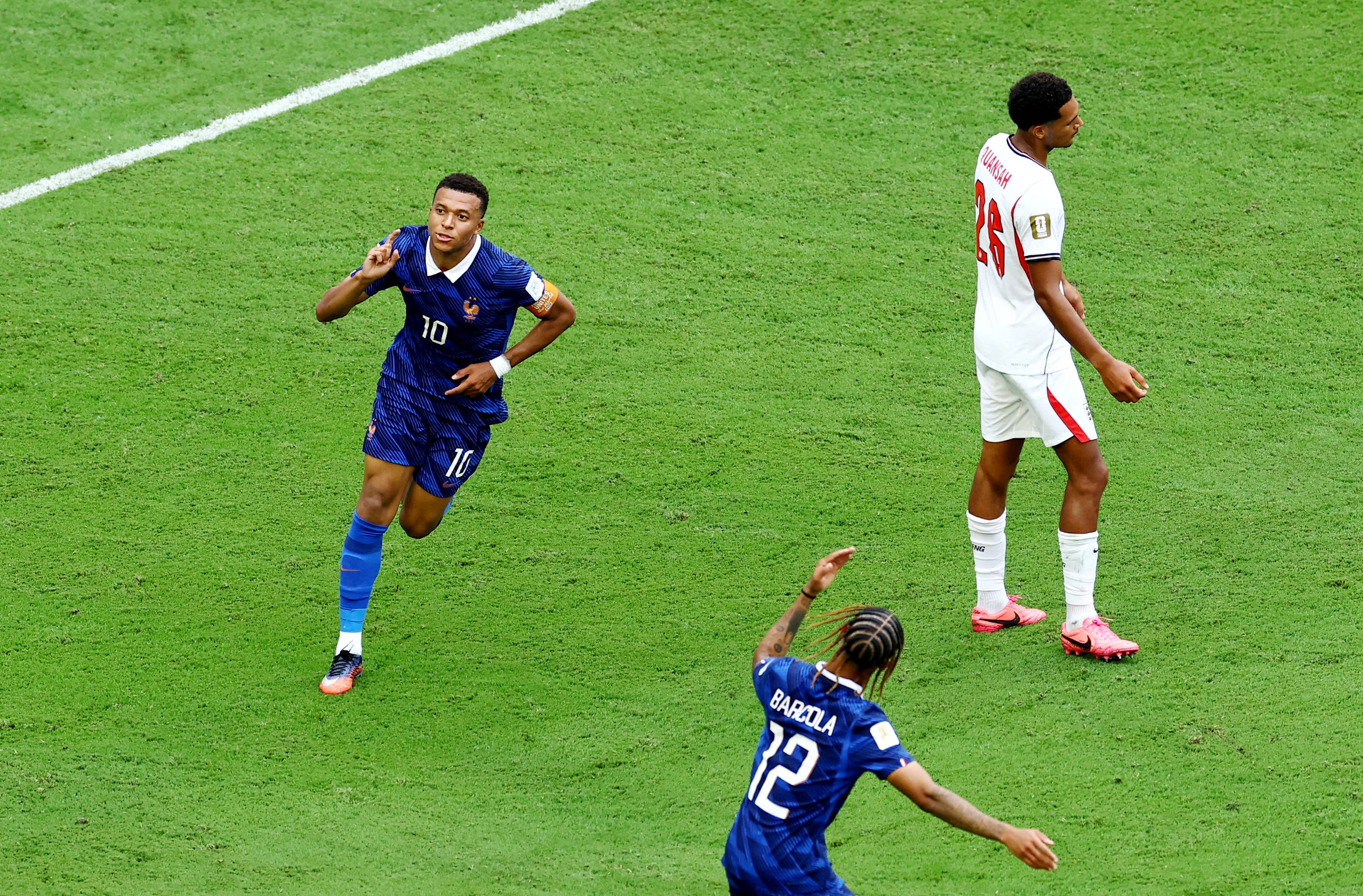 Soccer Football - FIFA World Cup 2026 - Bronze Final - France v England - Miami Stadium, Miami Gardens, Florida, U.S. - July 18, 2026 France's Kylian Mbappe celebrates scoring their third goal with Bradley Barcola REUTERS/Marco Bello

