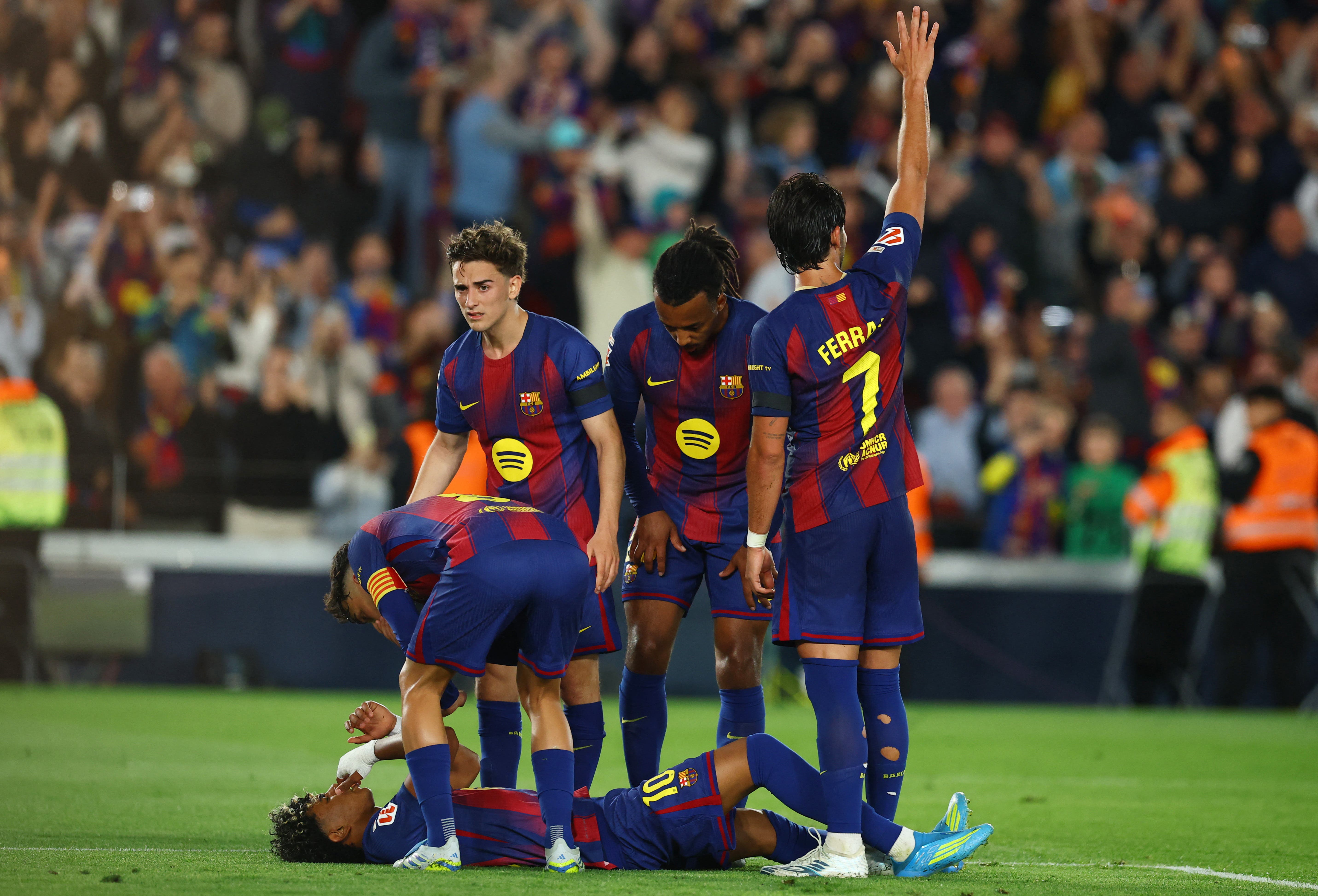 Soccer Football - LaLiga - FC Barcelona v Celta Vigo - Spotify Camp Nou, Barcelona, Spain - April 22, 2026 FC Barcelona's Lamine Yamal reacts after sustaining an injury REUTERS/Albert Gea