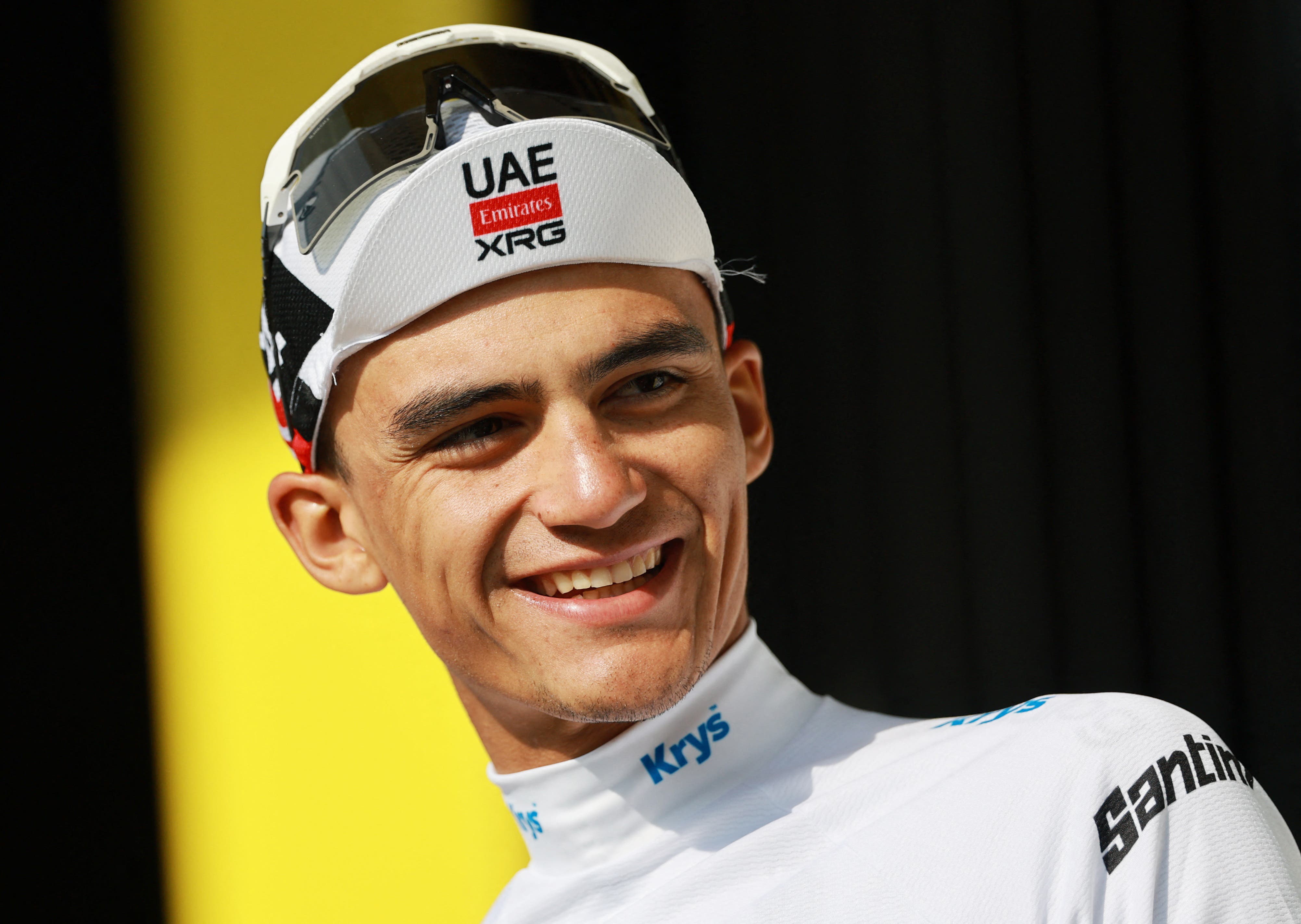 Cycling - Tour de France - Stage 15 - Champagnole to Plateau de Solaison - Plateau de Solaison , France - July 19, 2026 UAE Team Emirates XRG's Isaac Del Toro celebrates on the podium wearing the white jersey after stage 15 REUTERS/Stephanie Lecocq

