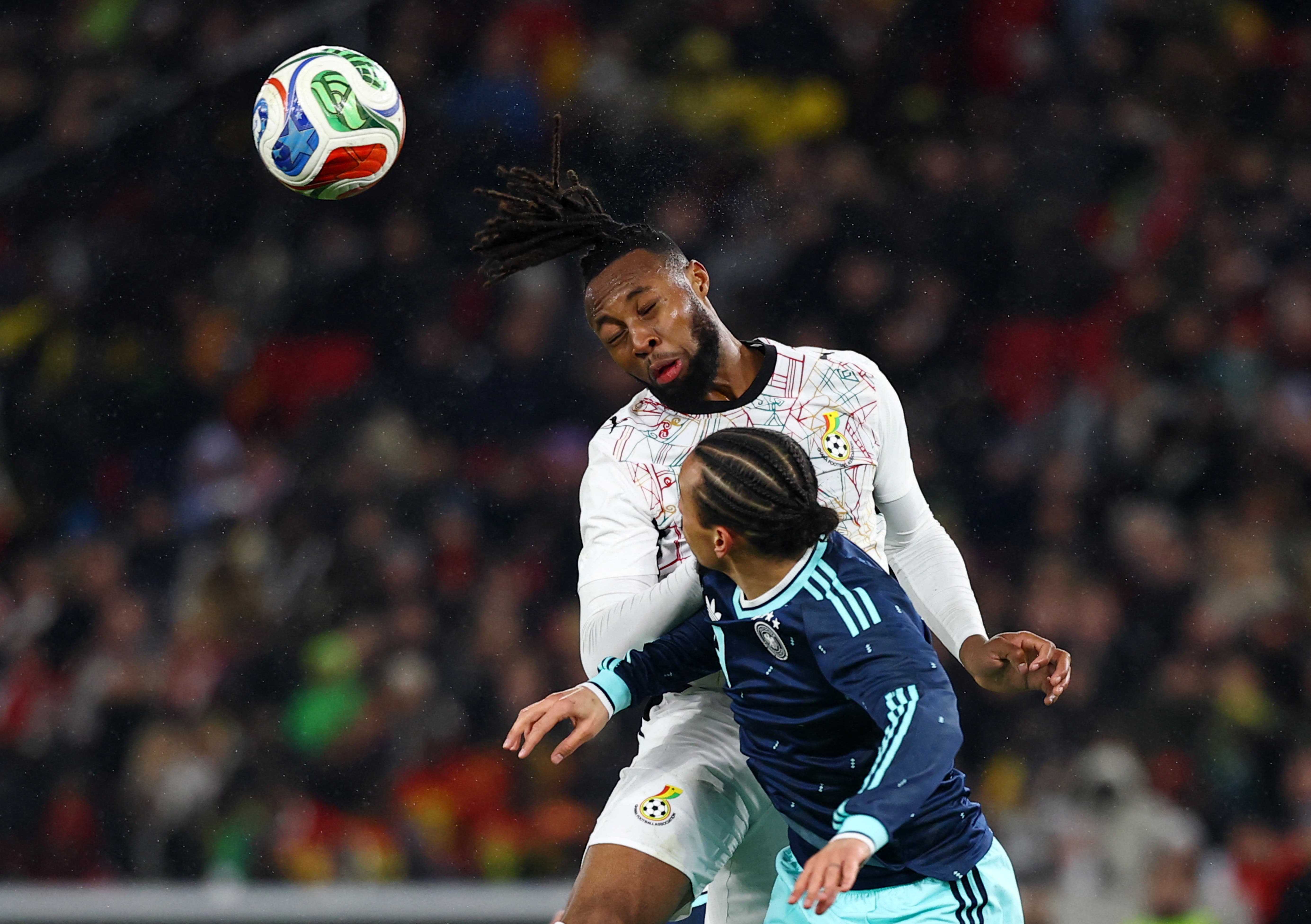 Soccer Football - International Friendly - Germany v Ghana - MHPArena, Stuttgart, Germany - March 30, 2026 Ghana's Antoine Semenyo in action with Germany's Leroy Sane REUTERS/Kai Pfaffenbach