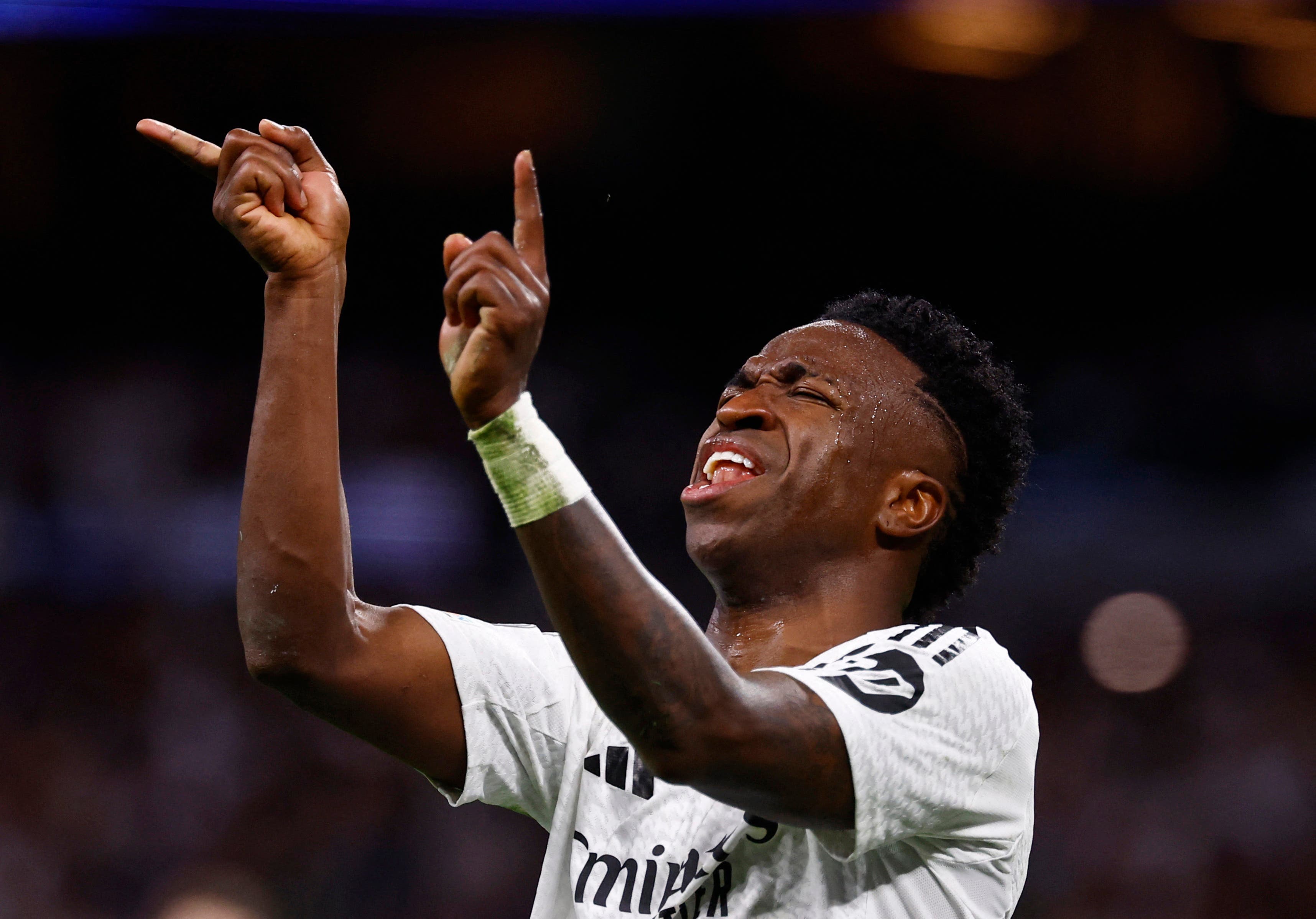 Soccer Football - Champions League - Quarter Final - Second Leg - Real Madrid v Arsenal - Santiago Bernabeu, Madrid, Spain - April 16, 2025 Real Madrid's Vinicius Junior reacts REUTERS/Susana Vera