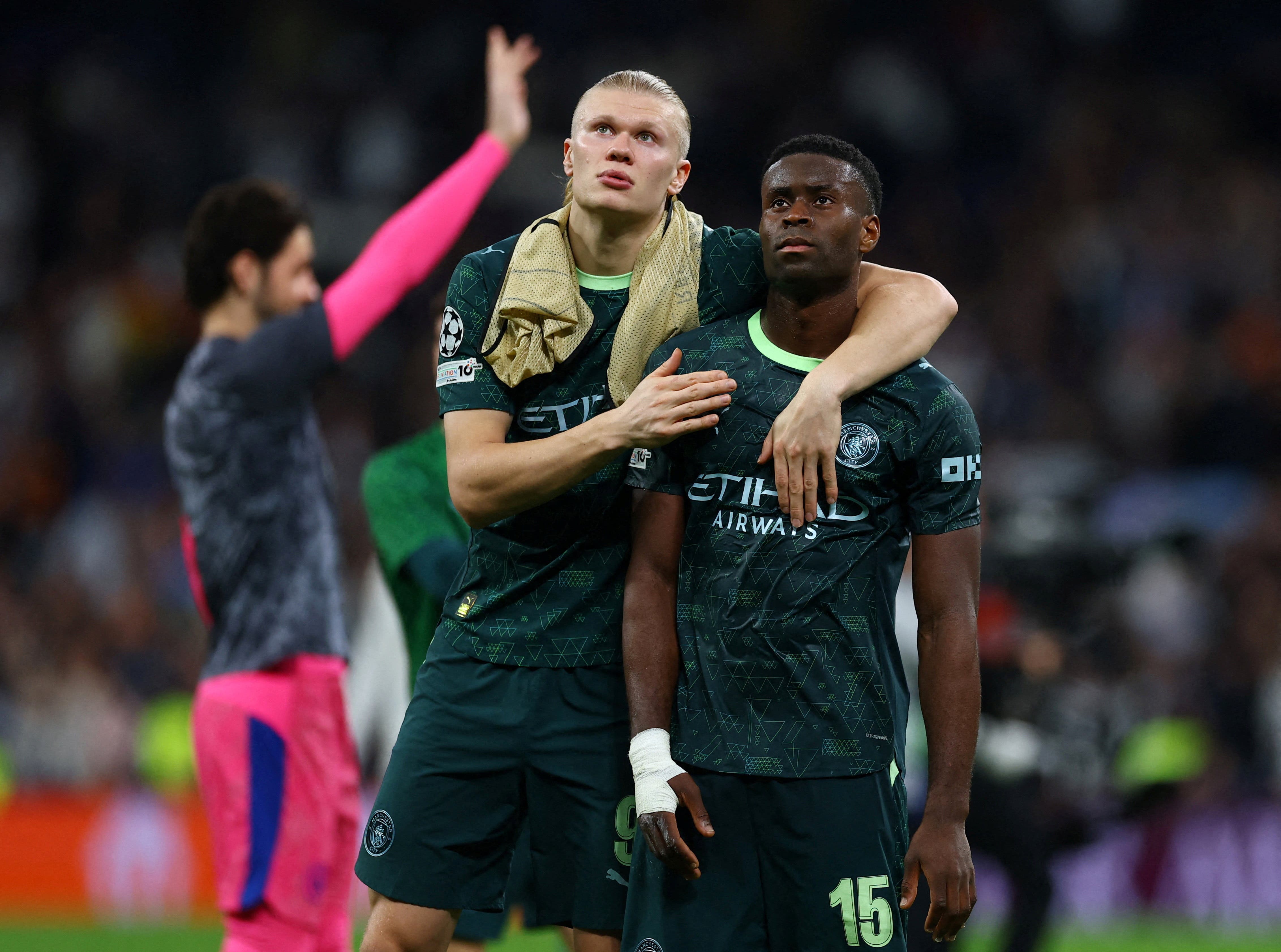 Soccer Football - UEFA Champions League - Round of 16 - First Leg - Real Madrid v Manchester City - Santiago Bernabeu, Madrid, Spain - March 11, 2026 Manchester City's Erling Haaland and Marc Guehi look dejected after the match Action Images via Reuters/Matthew Childs TPX IMAGES OF THE DAY