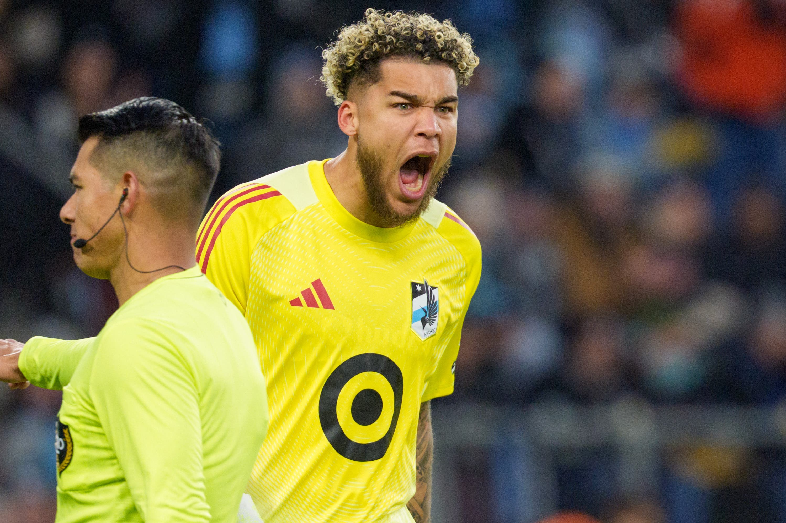 Nov 8, 2025; Saint Paul, Minnesota, USA; Minnesota United goalkeeper Dayne St. Clair (97) celebrates a stop against the Seattle Sounders in the second half at Allianz Field. Mandatory Credit: Matt Blewett-Imagn Images