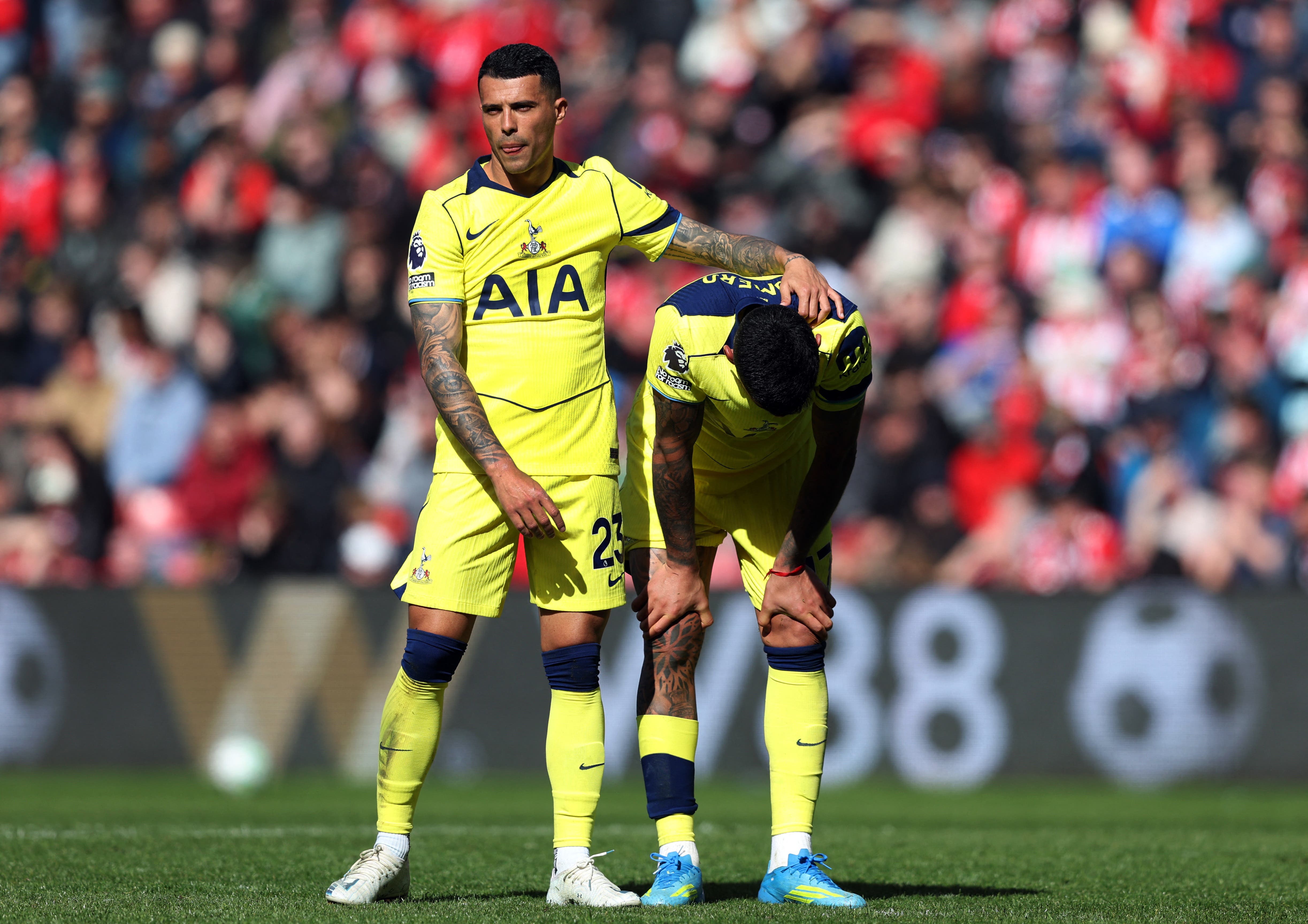 Soccer Football - Premier League - Sunderland v Tottenham Hotspur - Stadium of Light, Sunderland, Britain - April 12, 2026 A dejected Tottenham Hotspur's Cristian Romero is consoled by Pedro Porro as he is substituted off after sustaining an injury
