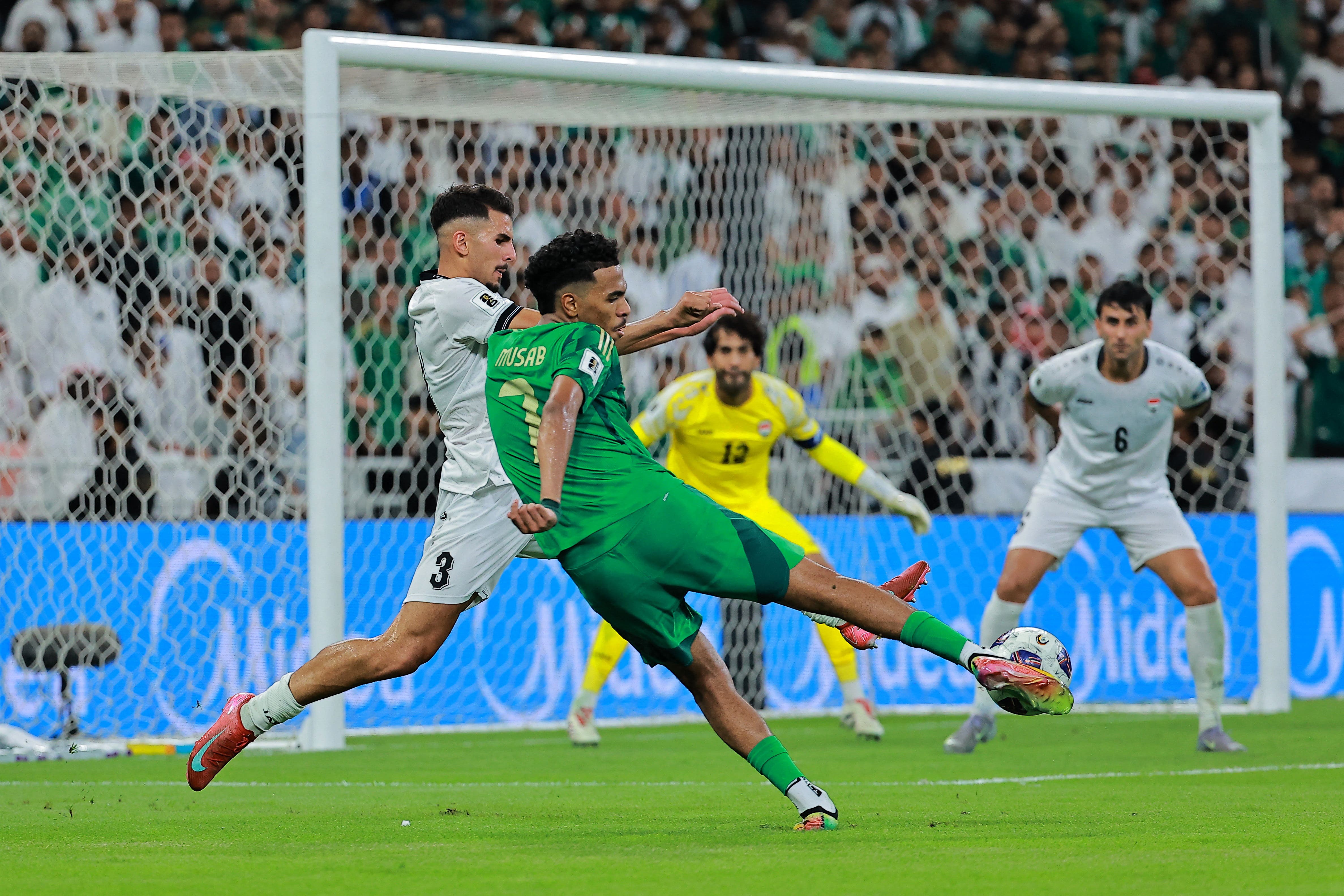 Soccer Football - FIFA World Cup - AFC Qualifiers - Group B - Saudi Arabia v Iraq - King Abdullah Sports City, Jeddah, Saudi Arabia - October 14, 2025 Saudi Arabia's Musab Al Juwayr shoots at goal REUTERS/Stringer