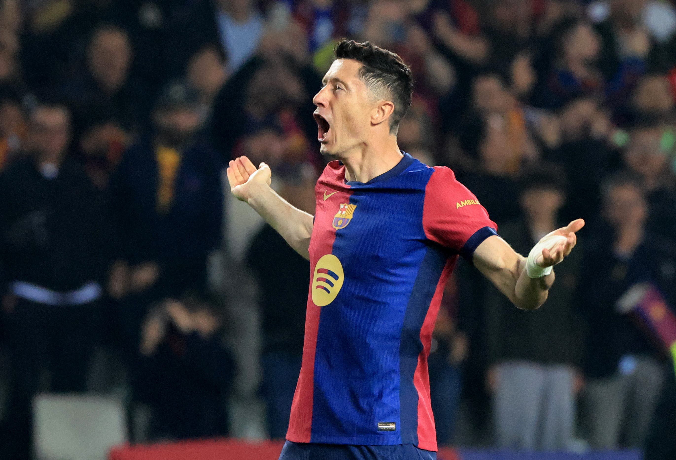 Soccer Football - Champions League - Quarter Final - First Leg - FC Barcelona v Borussia Dortmund - Estadi Olimpic Lluis Companys, Barcelona, Spain - April 9, 2025 FC Barcelona's Robert Lewandowski celebrates scoring their second goal REUTERS/Nacho Doce