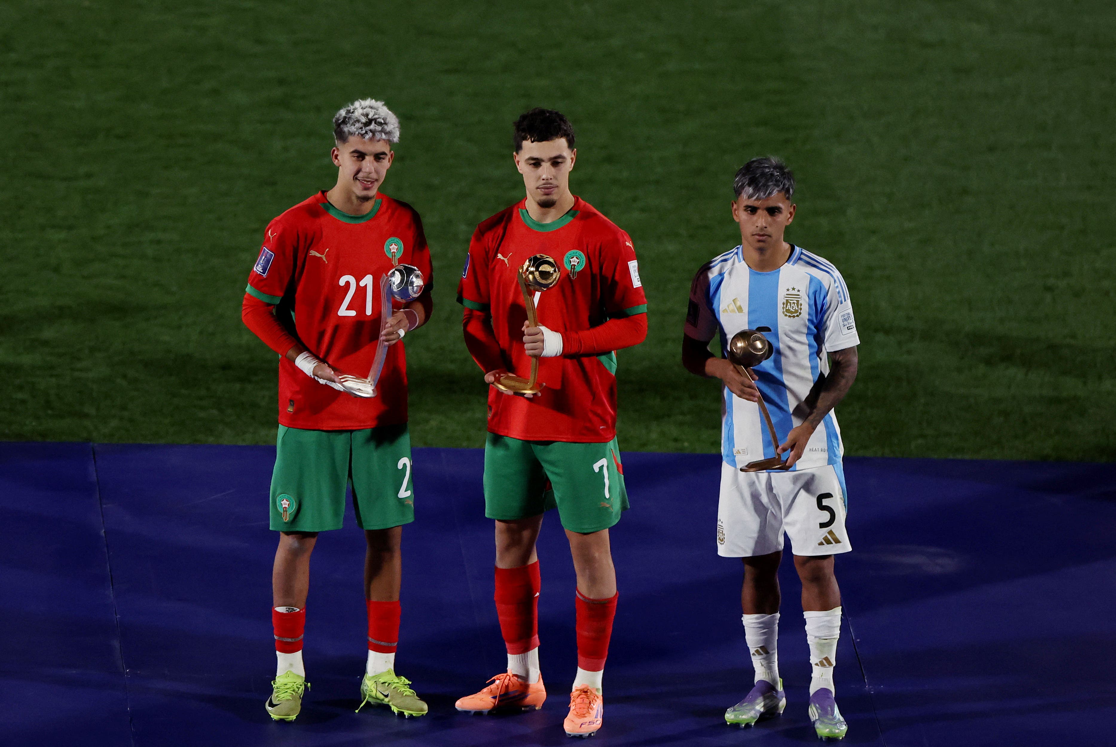 Soccer Football - FIFA U-20 World Cup - Final - Argentina v Morocco - Estadio Nacional Julio Martinez Pradanos, Santiago, Chile - October 19, 2025 Golden ball Morocco's Othmane Maamma, silver ball Morocco's Yassir Zabiri and bronze ball Argentina's Milton Delgado REUTERS/Pablo Sanhueza
