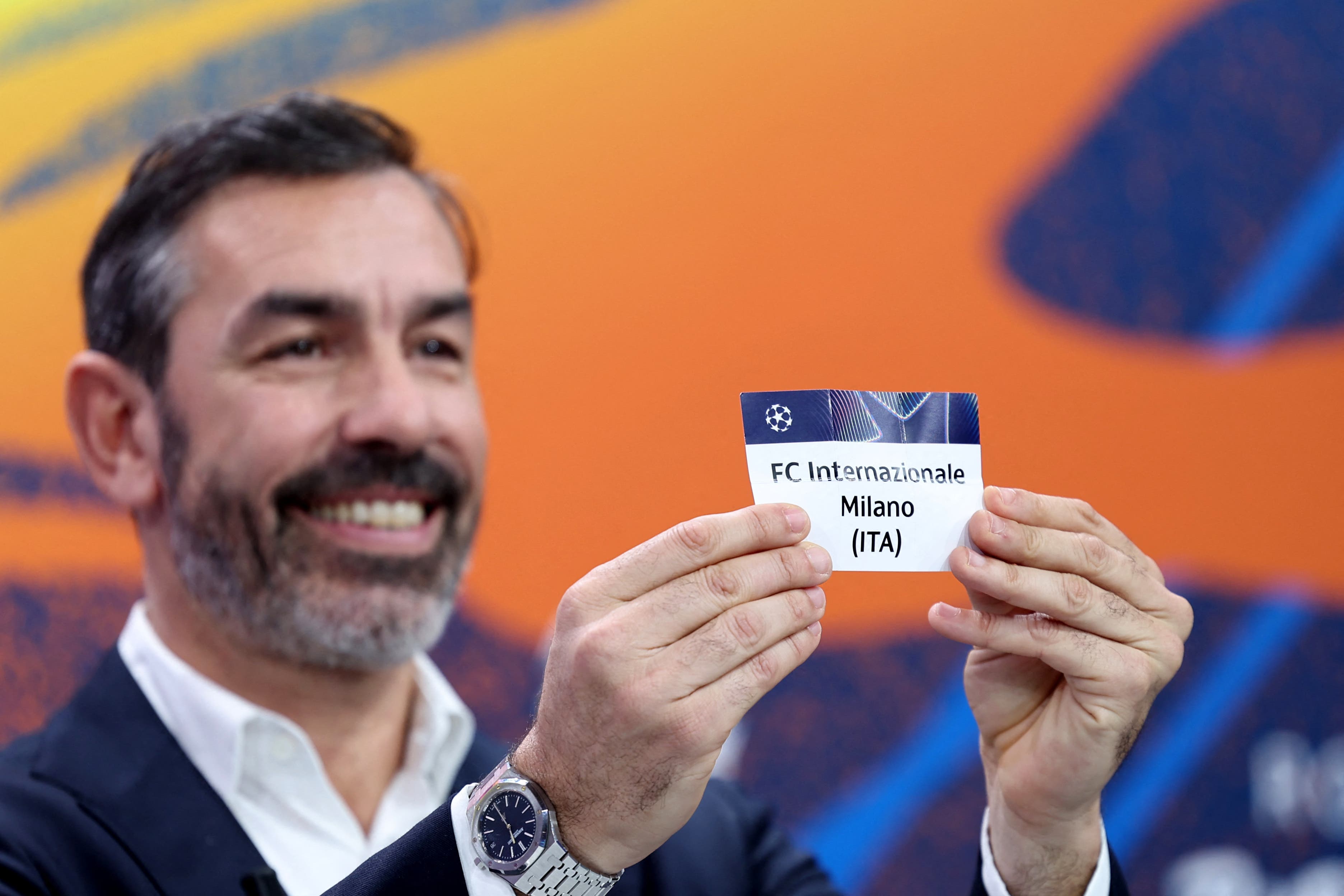Soccer Football - UEFA Champions League - Knockout Phase Playoffs Draw - UEFA Headquarters, Nyon, Switzerland - January 30, 2026 Former player Robert Pires draws Inter Milan REUTERS/Pierre Albouy