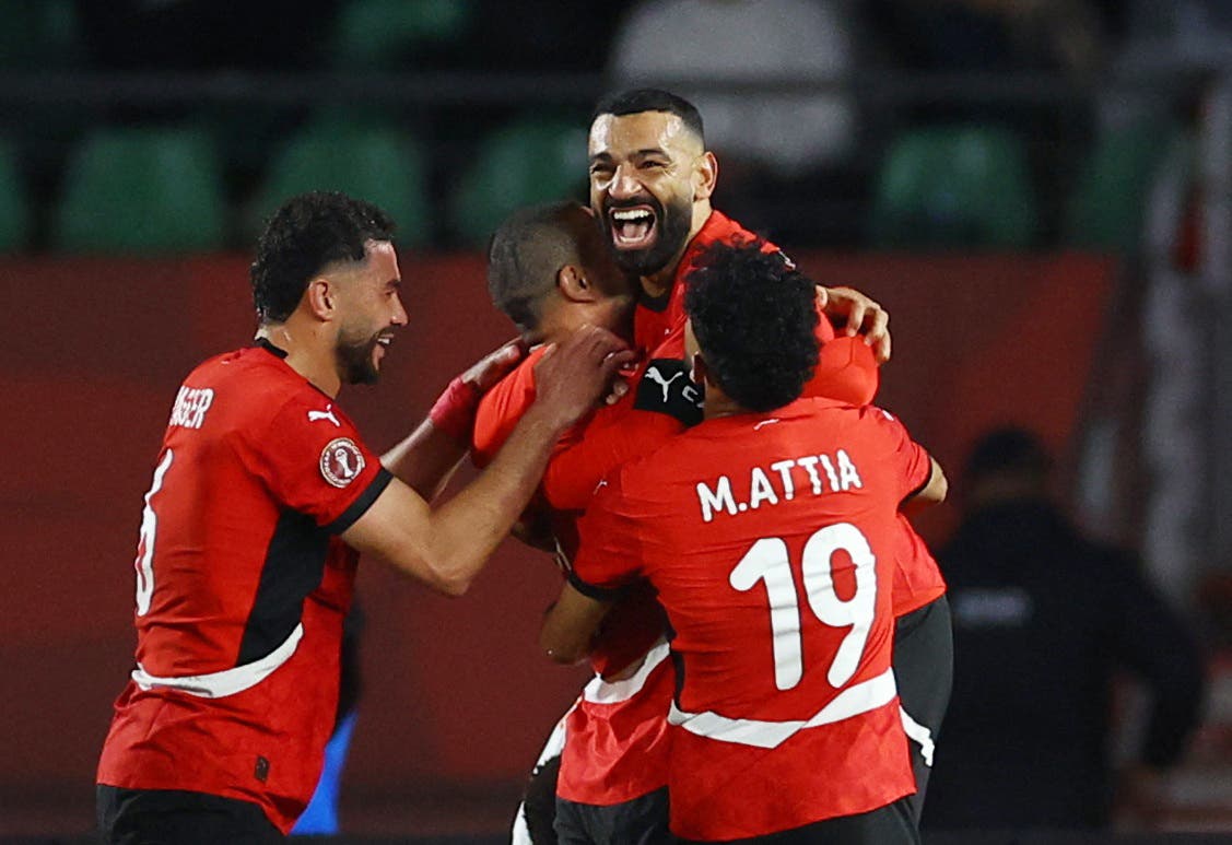 Soccer Football - CAF Africa Cup of Nations - Morocco 2025 - Quarter Final - Egypt v Ivory Coast - Adrar Stadium, Agadir, Morocco - January 10, 2026 Egypt's Ramy Rabia celebrates scoring their second goal with teammates REUTERS/Siphiwe Sibeko