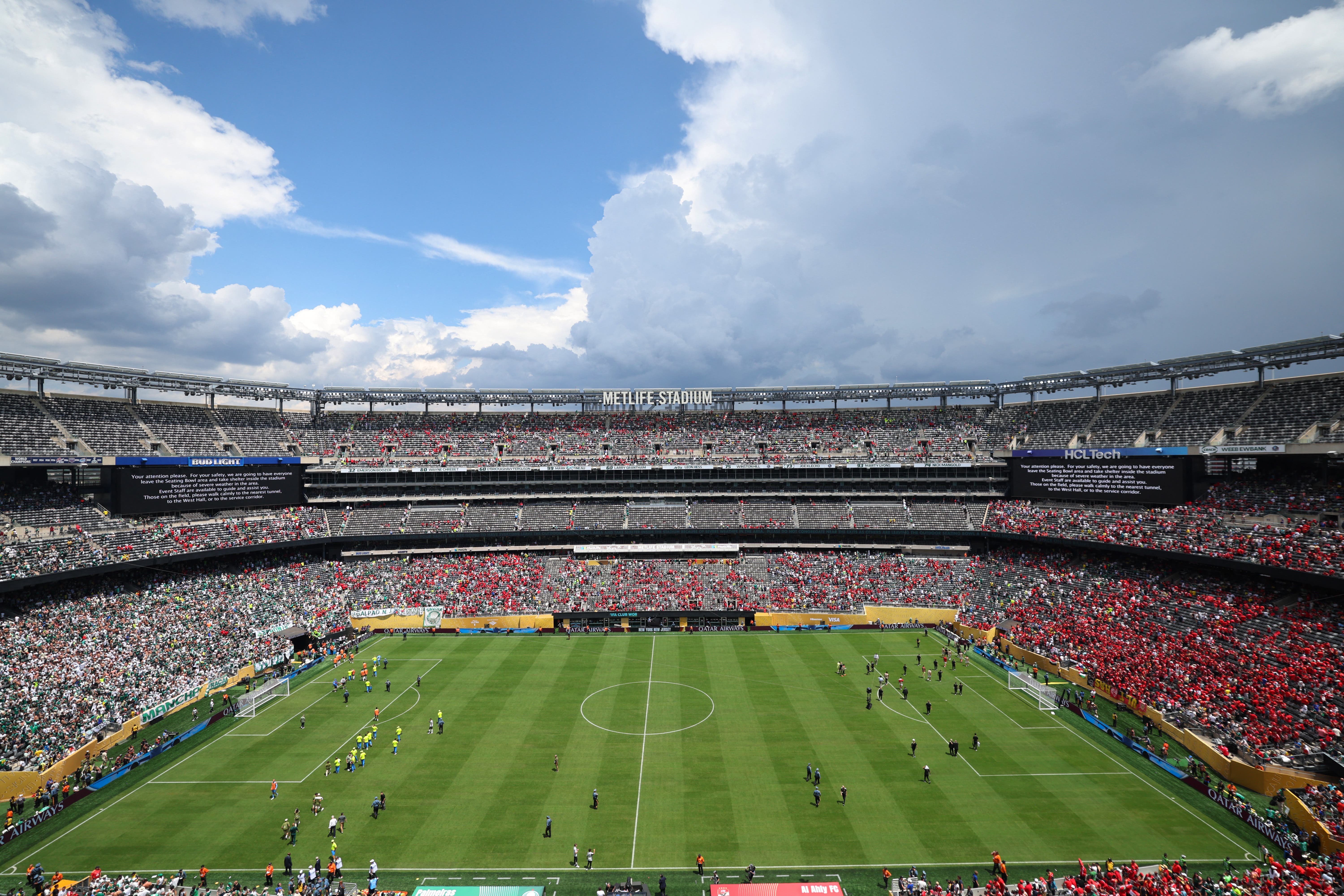  General view as the players walk off the pitch as the match is suspended due to adverse weather 
