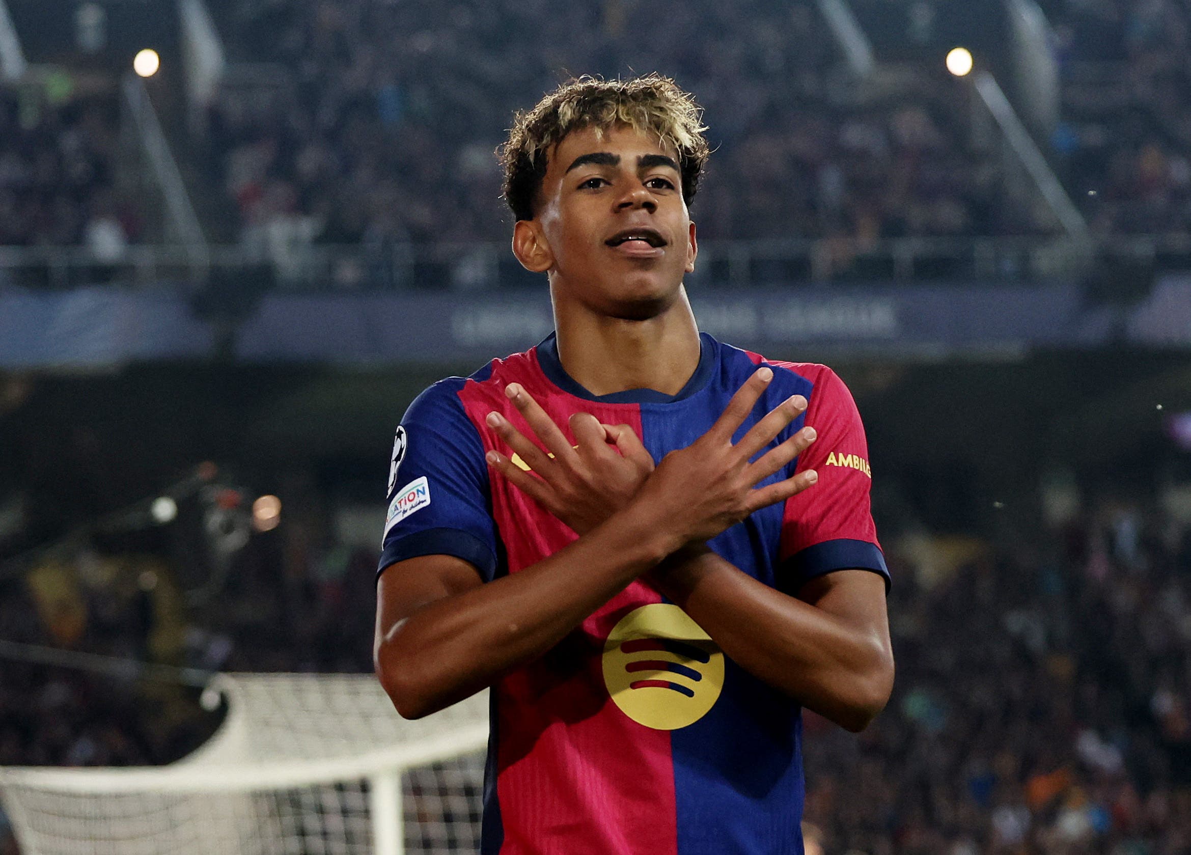 FC Barcelona's Lamine Yamal celebrates scoring 