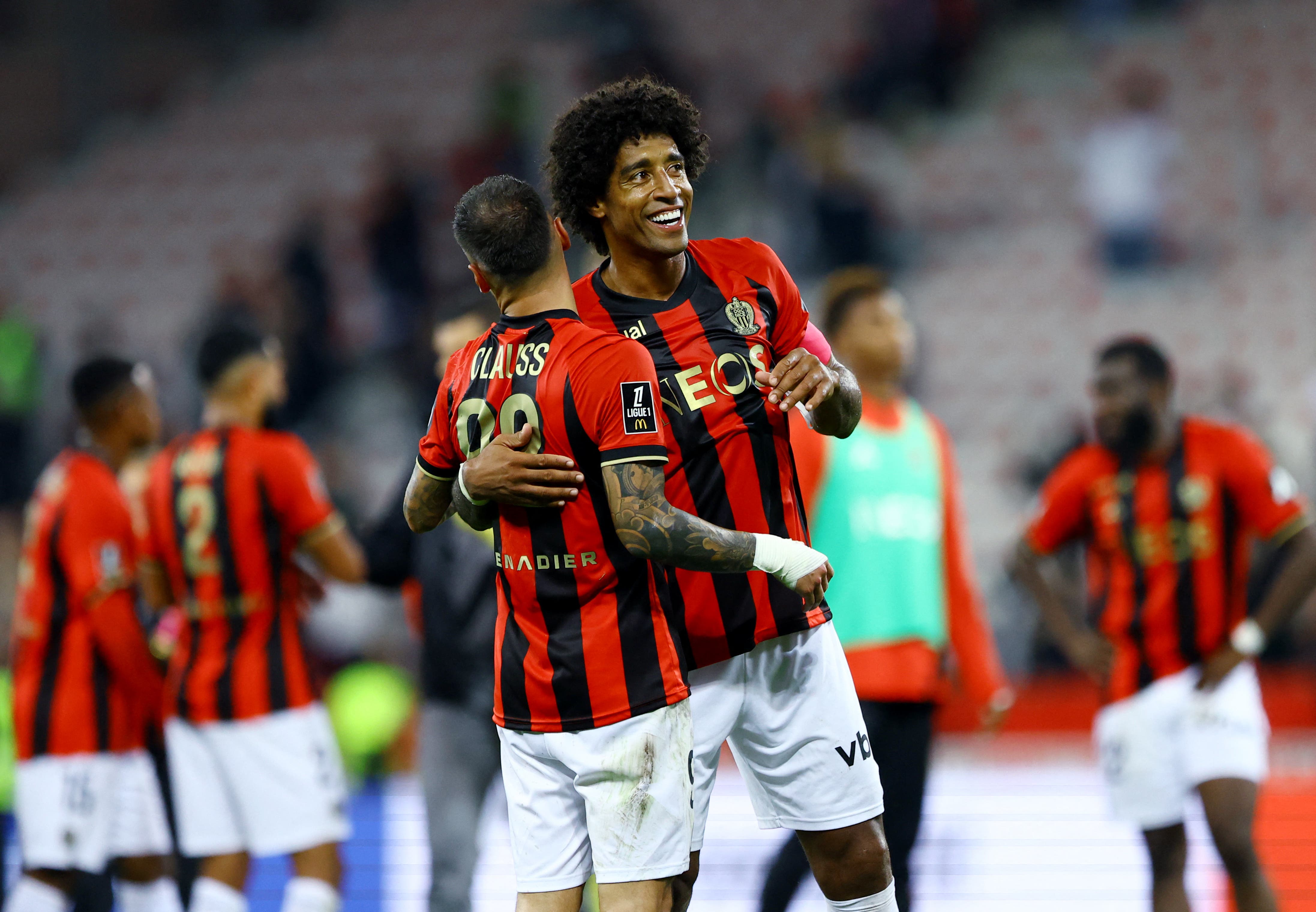  OGC Nice's Dante with Jonathan Clauss after the match 