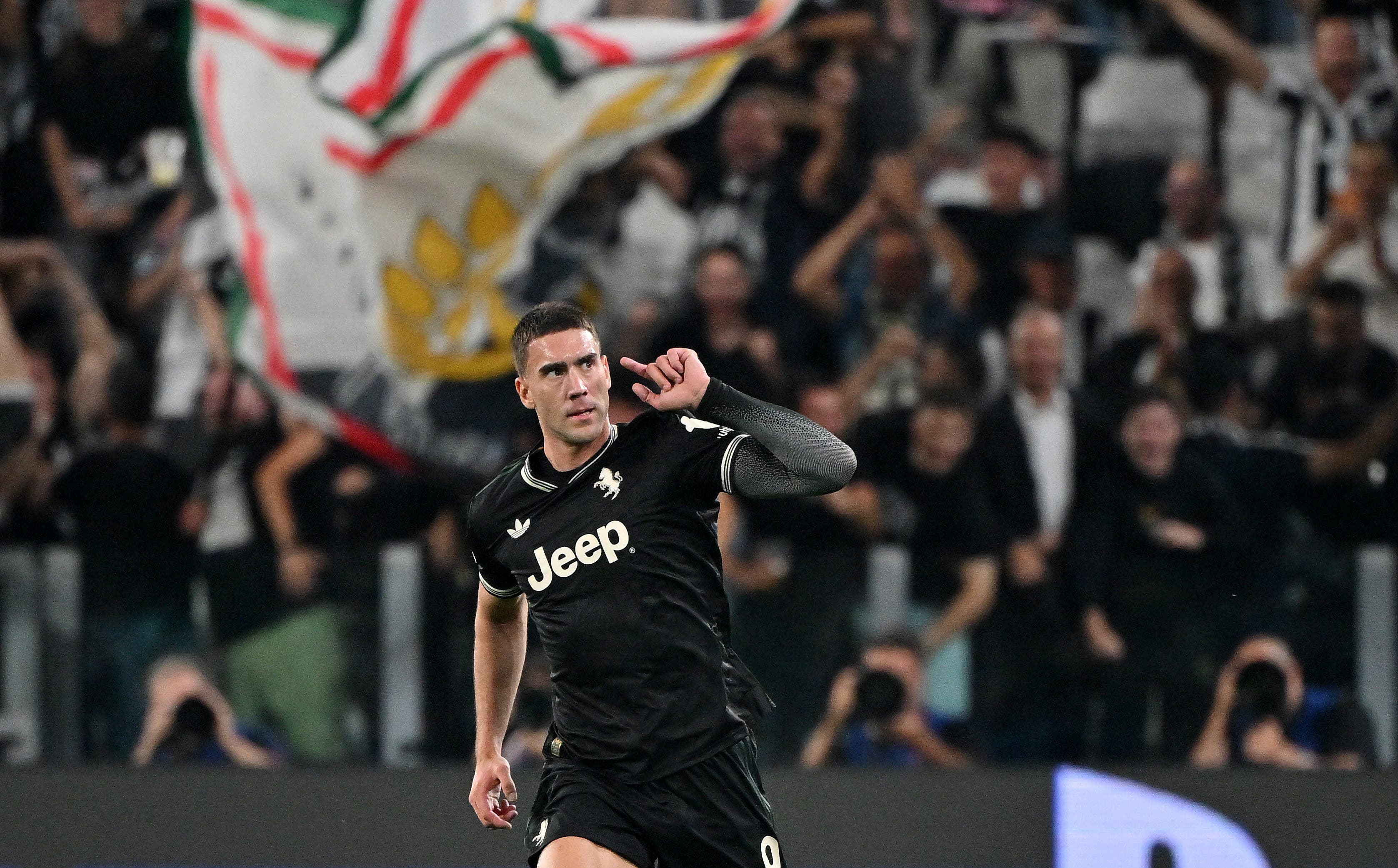 Soccer Football - UEFA Champions League - Juventus v Borussia Dortmund - Allianz Stadium, Turin, Italy - September 16, 2025 Juventus' Dusan Vlahovic celebrates scoring their second goal REUTERS/Alberto Lingria