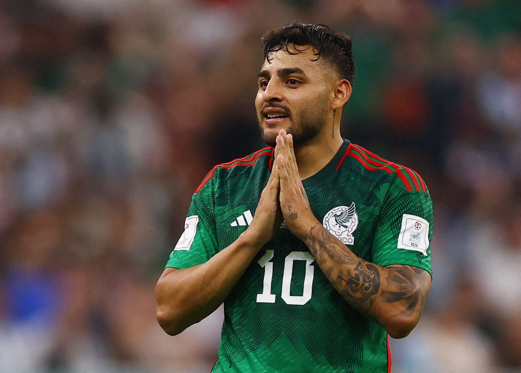 Soccer Football - FIFA World Cup Qatar 2022 - Group C - Argentina v Mexico - Lusail Stadium, Lusail, Qatar - November 26, 2022 Mexico's Alexis Vega reacts REUTERS/Kai Pfaffenbach