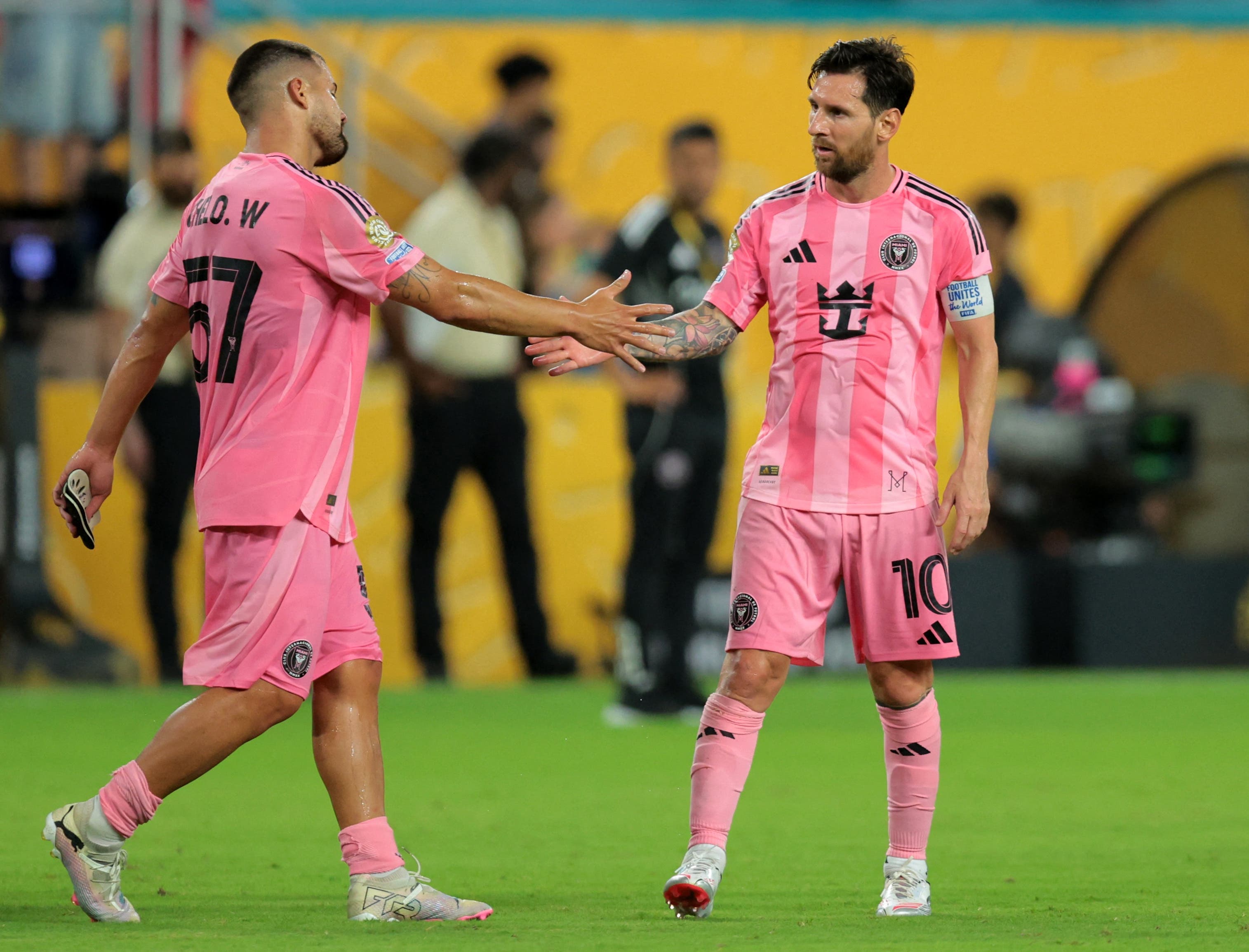 Inter Miami CF's Marcelo Weigandt and Lionel Messi after the match