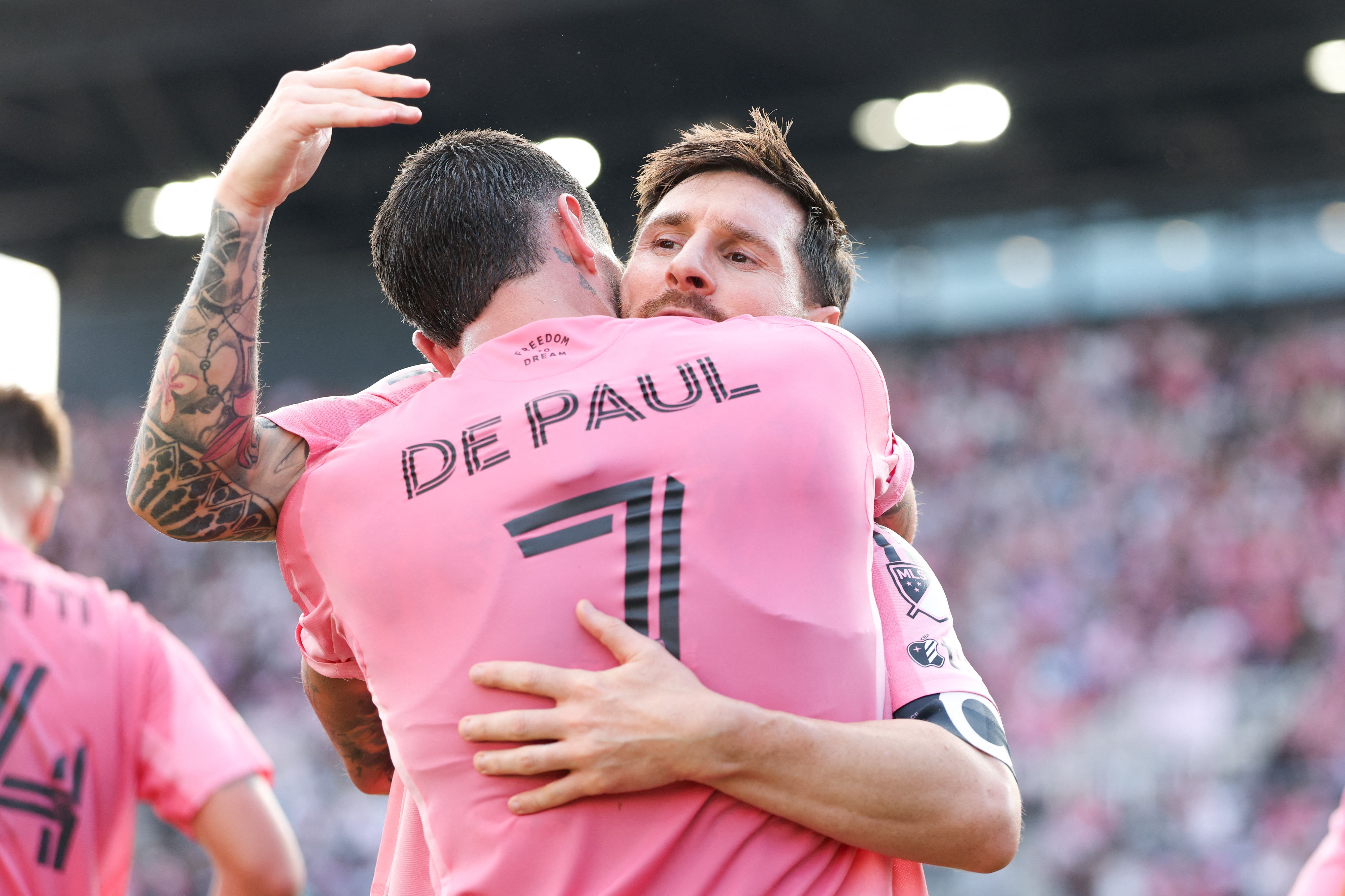 Dec 6, 2025; Fort Lauderdale, Florida, USA; Inter Miami midfielder Rodrigo de Paul (7) celebrates with forward Lionel Messi (10) after scoring his goal against the Vancouver Whitecaps FC in the second half during the 2025 MLS Cup at Chase Stadium. Mandatory Credit: Nathan Ray Seebeck-Imagn Images