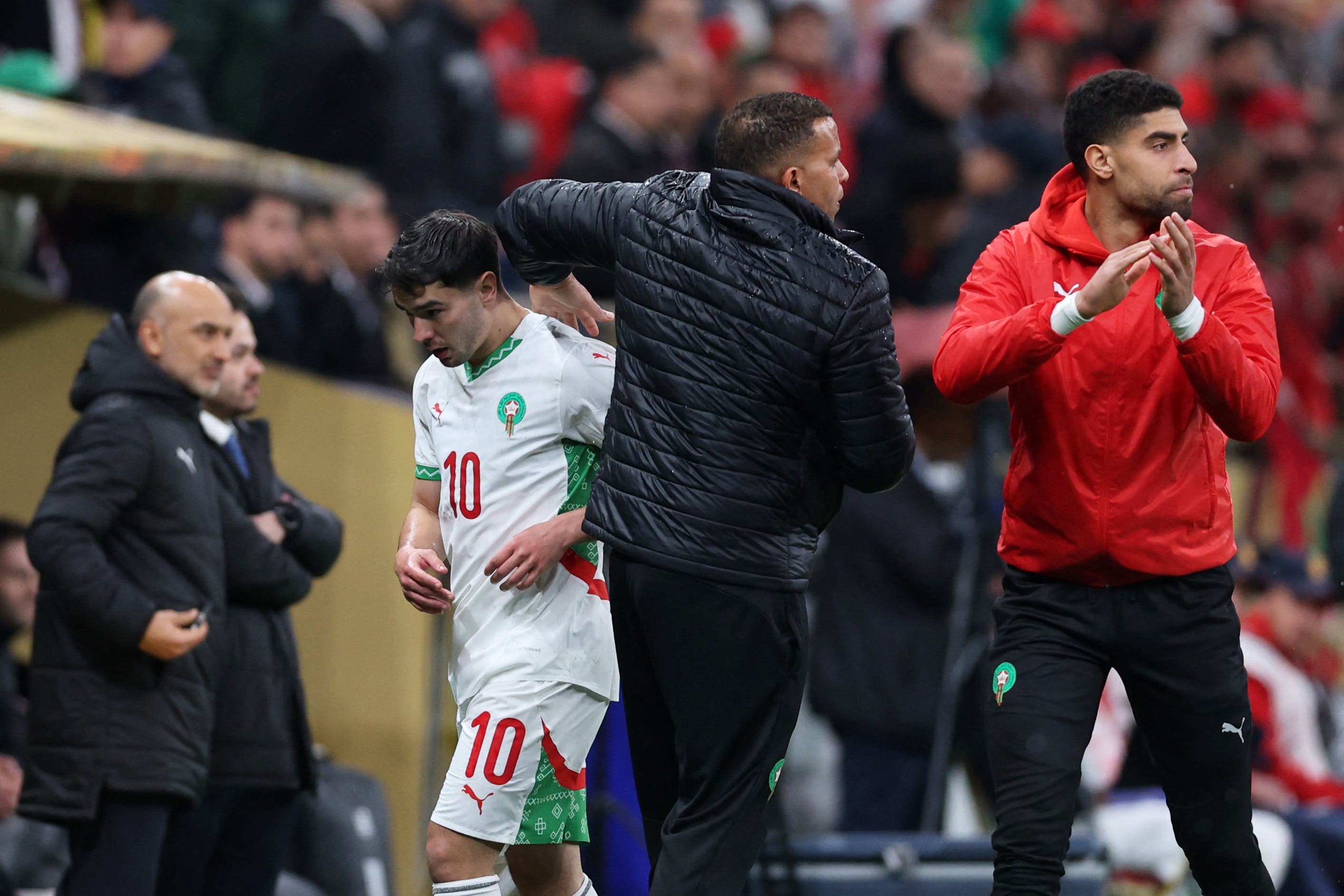 Soccer Football - CAF Africa Cup of Nations - Morocco 2025 - Final - Senegal v Morocco - Prince Moulay Abdellah Stadium, Rabat, Morocco - January 18, 2026 Morocco's Brahim Diaz looks dejected as he leaves the pitch after being substituted REUTERS/Amr Abdallah Dalsh