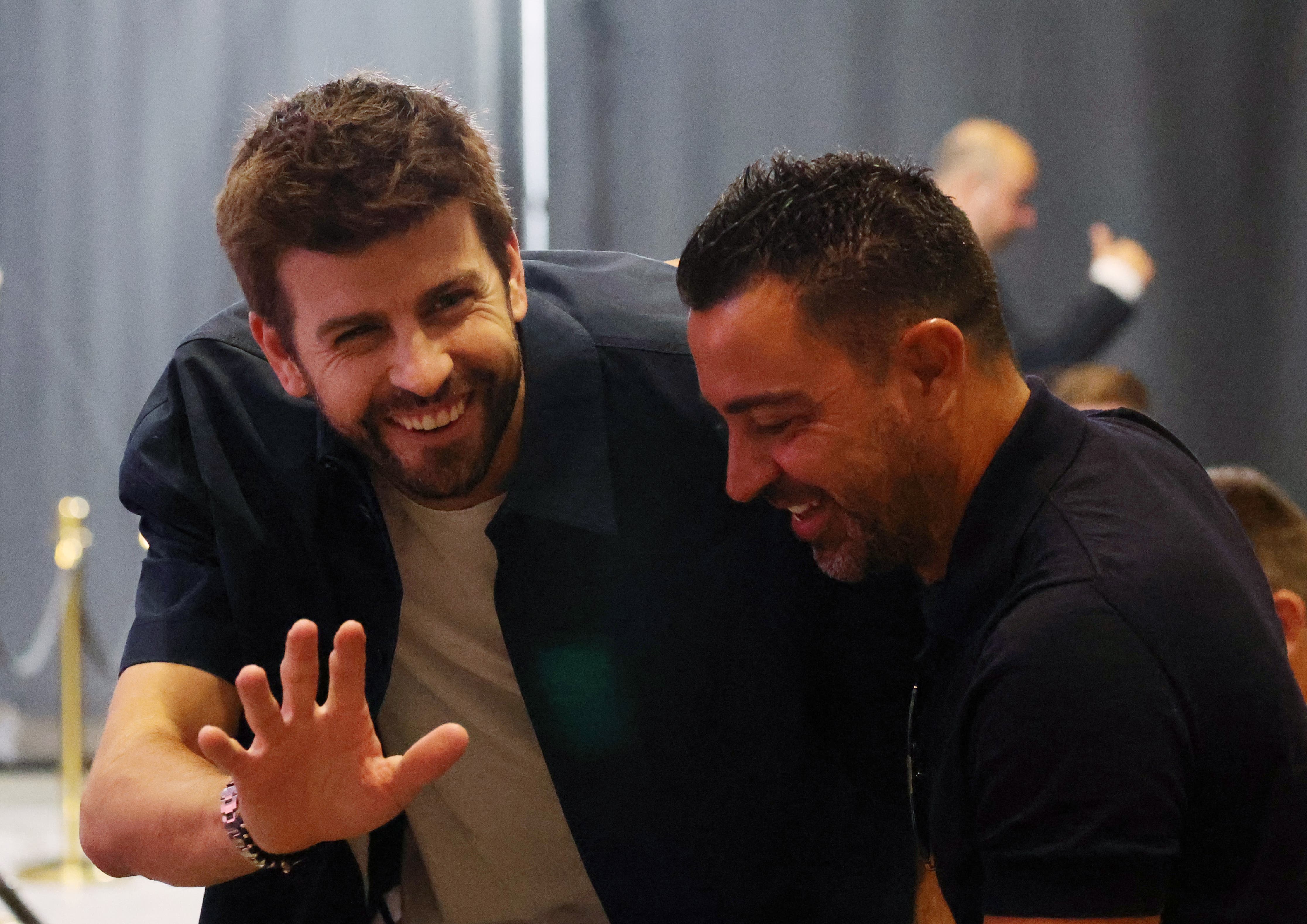 Gerard Piqué and Xavi Hernández