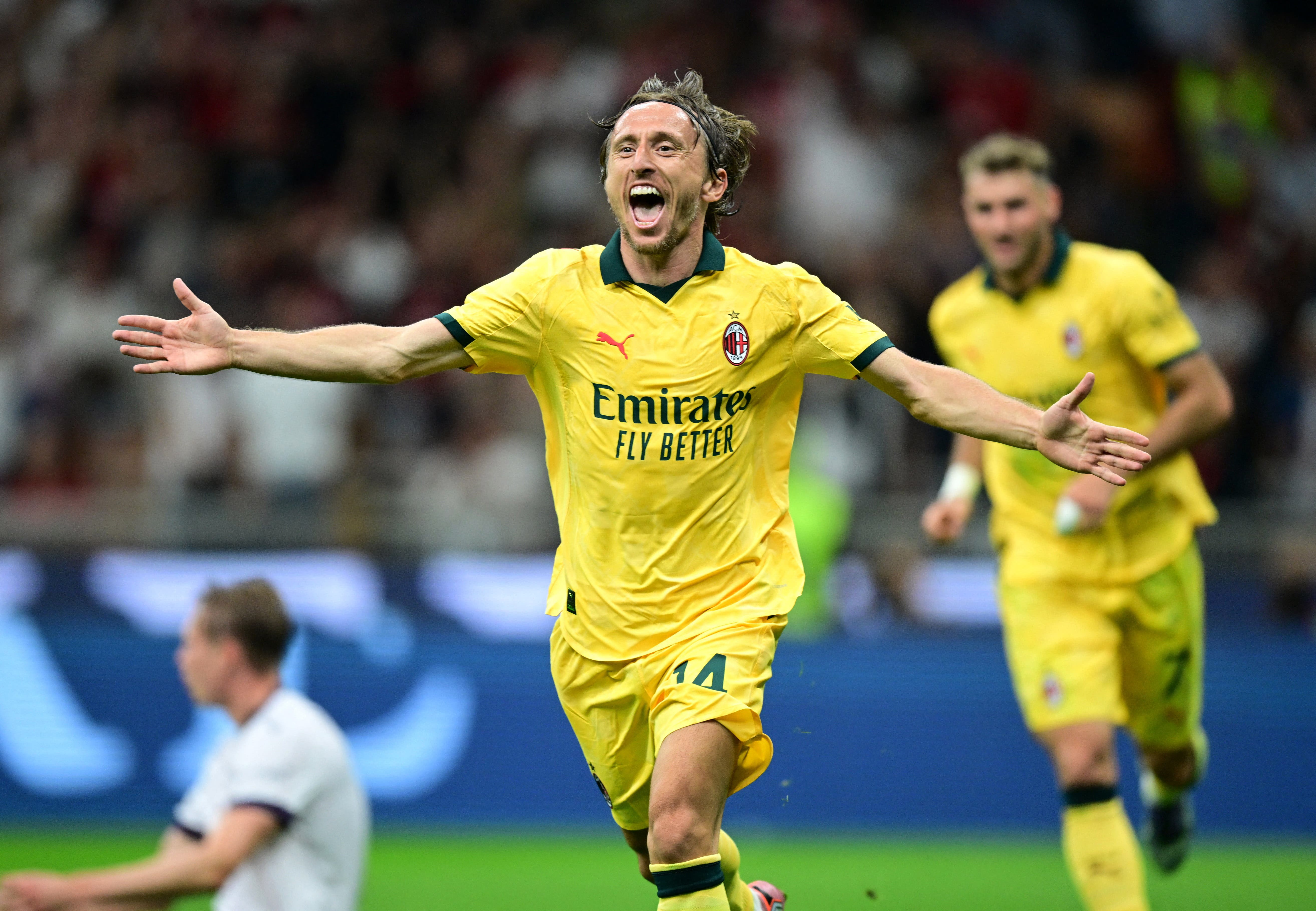 Soccer Football - Serie A - AC Milan v Bologna - San Siro, Milan, Italy - September 14, 2025 AC Milan's Luka Modric celebrates scoring their first goal REUTERS/Daniele Mascolo