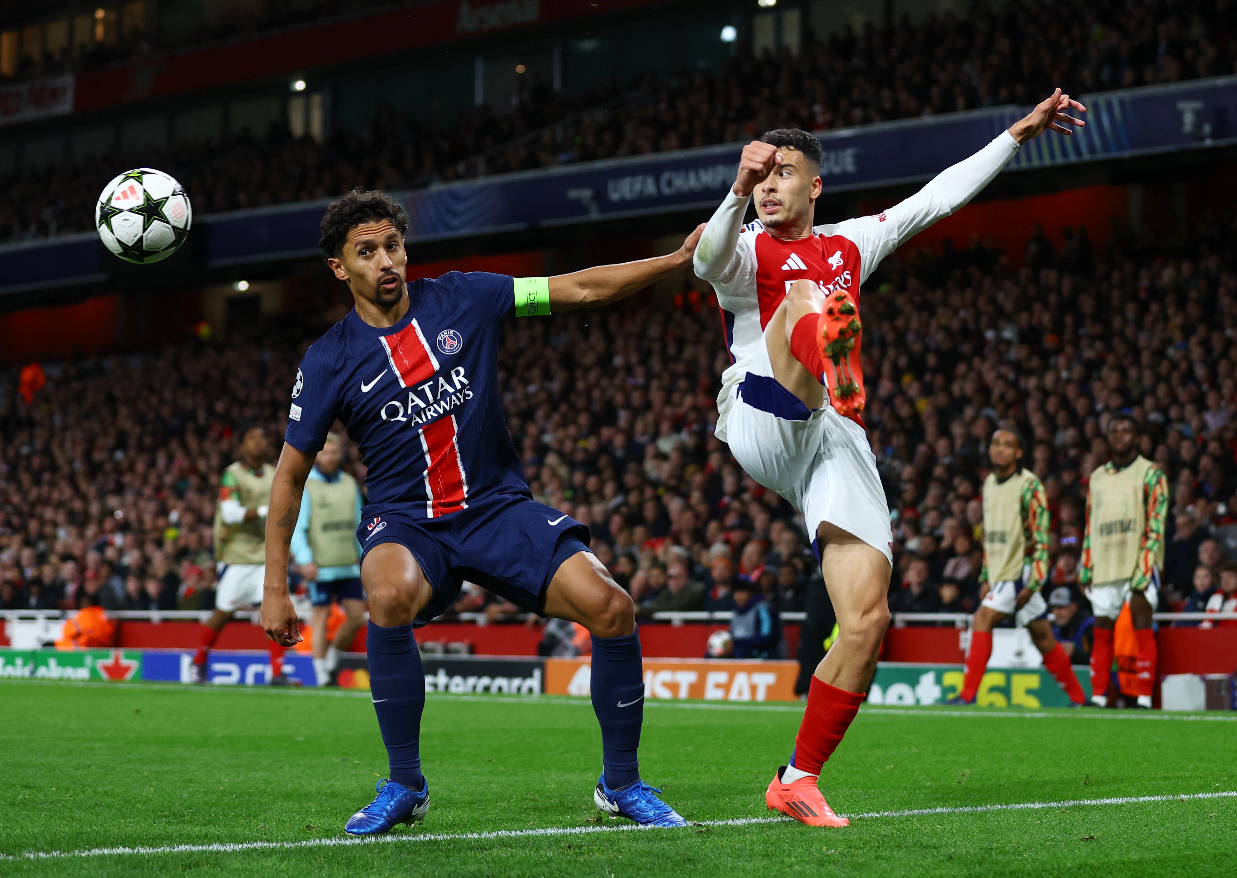 Soccer Football - Champions League - Arsenal v Paris St Germain - Emirates Stadium, London, Britain - October 1, 2024 Paris St Germain's Marquinhos in action with Arsenal's Gabriel Martinelli Action Images via Reuters/Matthew Childs