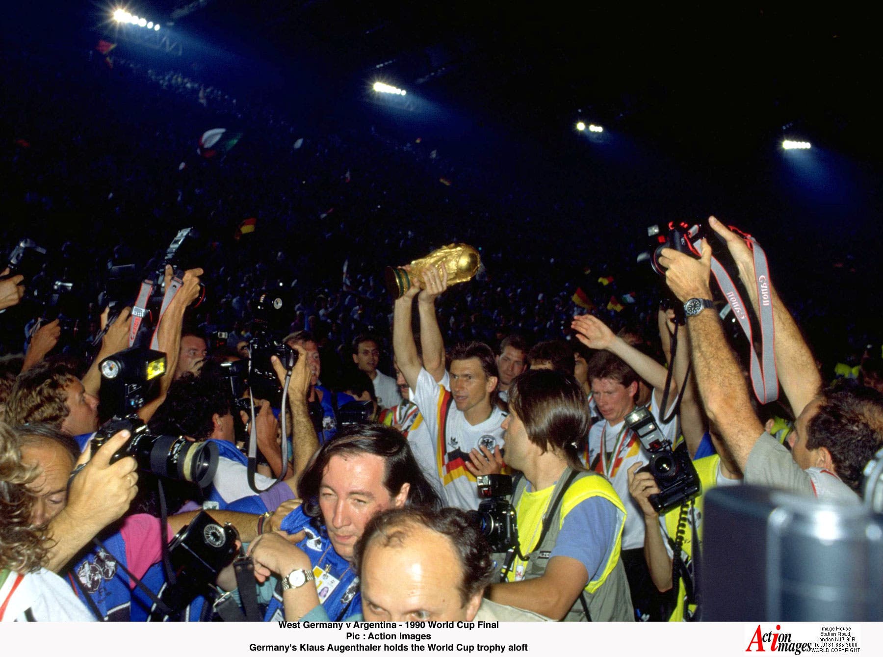 Football - 1990 FIFA World Cup Final - West Germany v Argentina - Olympic Stadium, Rome - 8/7/90 Klaus Augenthaler - West Germany holds aloft the World Cup Trophy Mandatoru Credit: Action Images