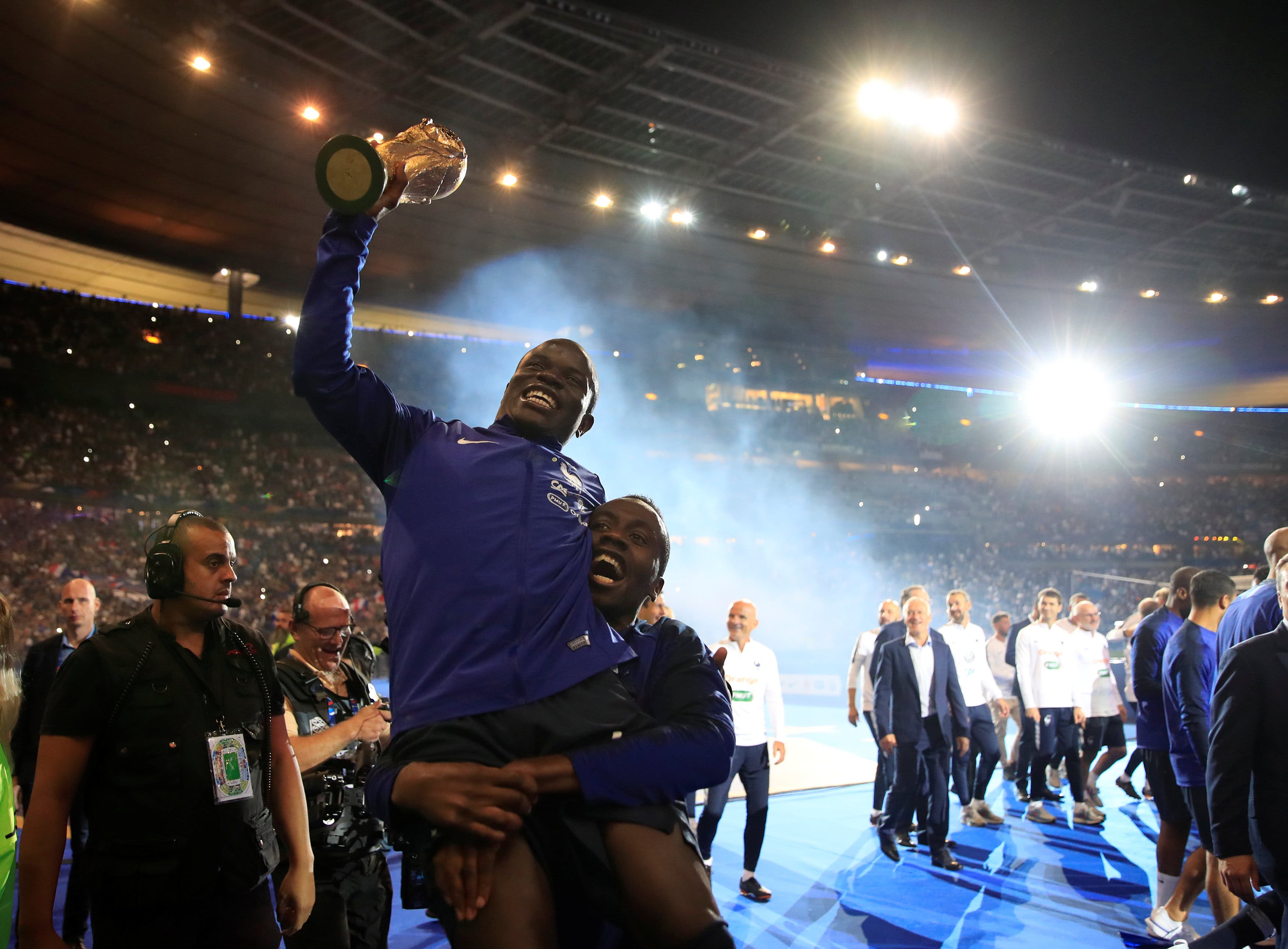Soccer Football - UEFA Nations League - League A - Group 1 - France v Netherlands - Stade de France, Saint-Denis, France - September 9, 2018 France's N'Golo Kante and Blaise Matuidi celebrate with the World Cup trophy during a ceremony after the match REUTERS/Gonzalo Fuentes