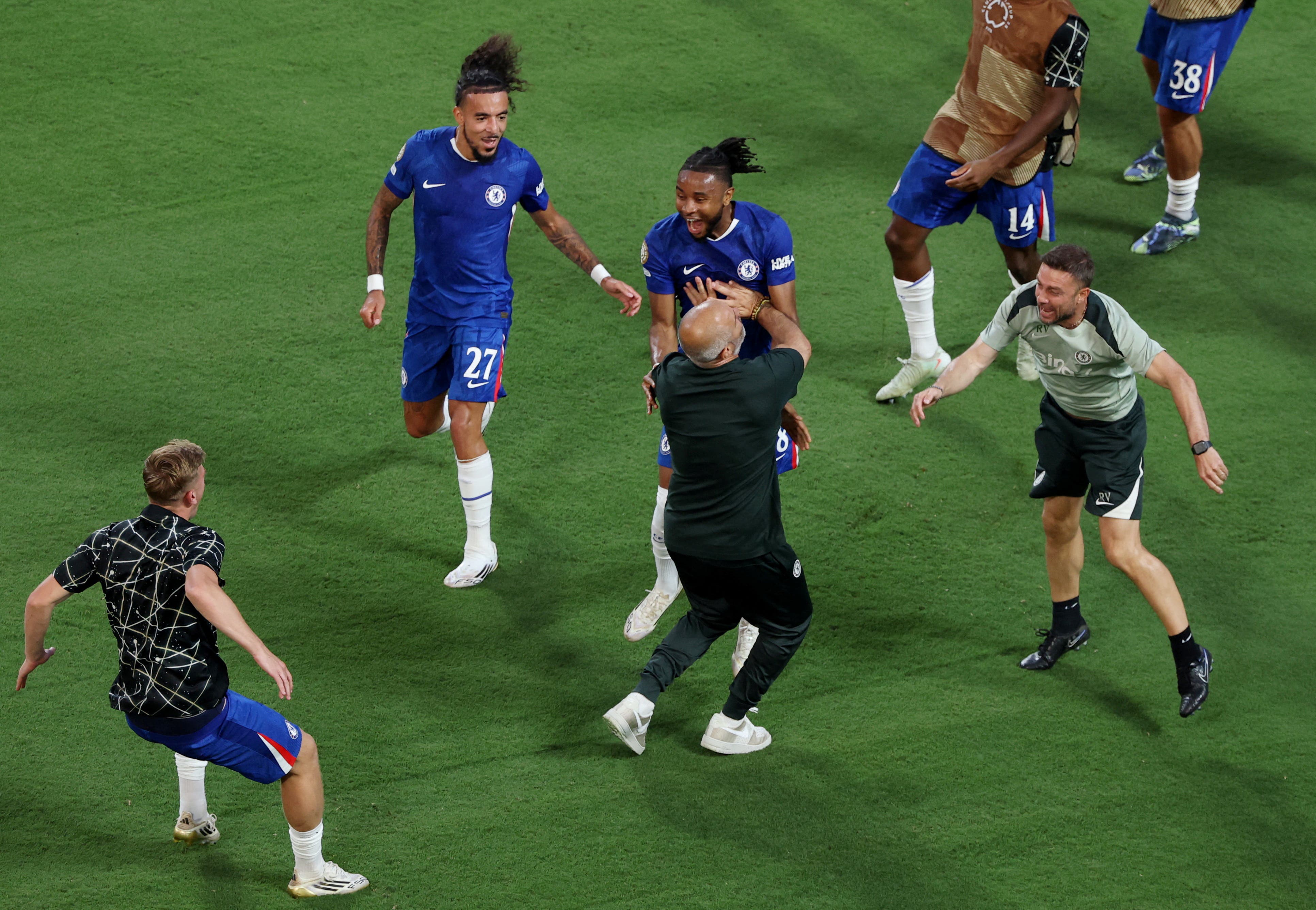 Chelsea's Christopher Nkunku celebrates scoring their second goal with teammates and Chelsea manager Enzo Maresca