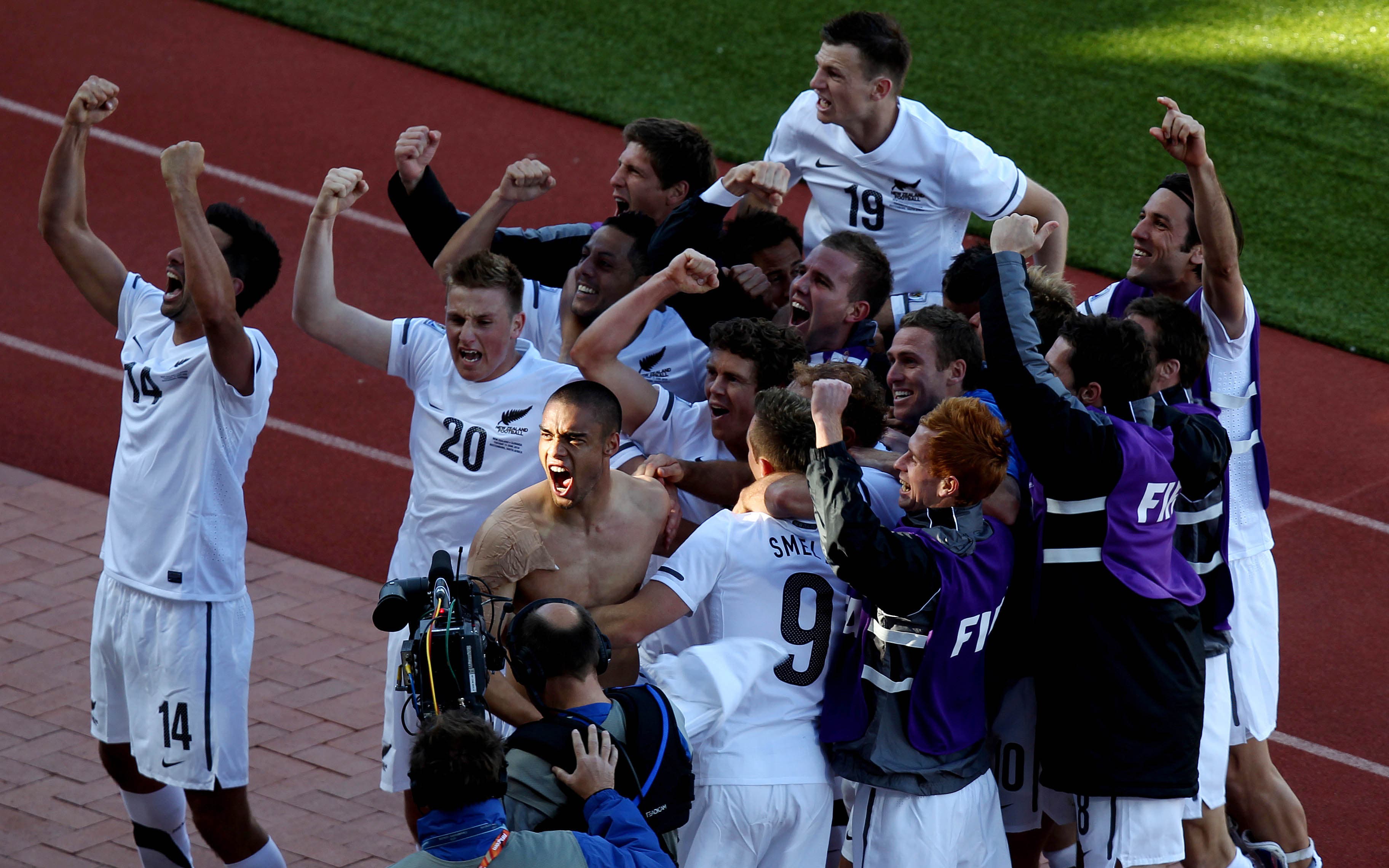 Football - New Zealand v Slovakia FIFA World Cup South Africa 2010 - Group F - Royal Bafokeng Stadium, Rustenburg, South Africa June - 15/6/10 New Zealand players celebrate after the match Mandatory Credit: Action Images / Scott Heavey Livepic