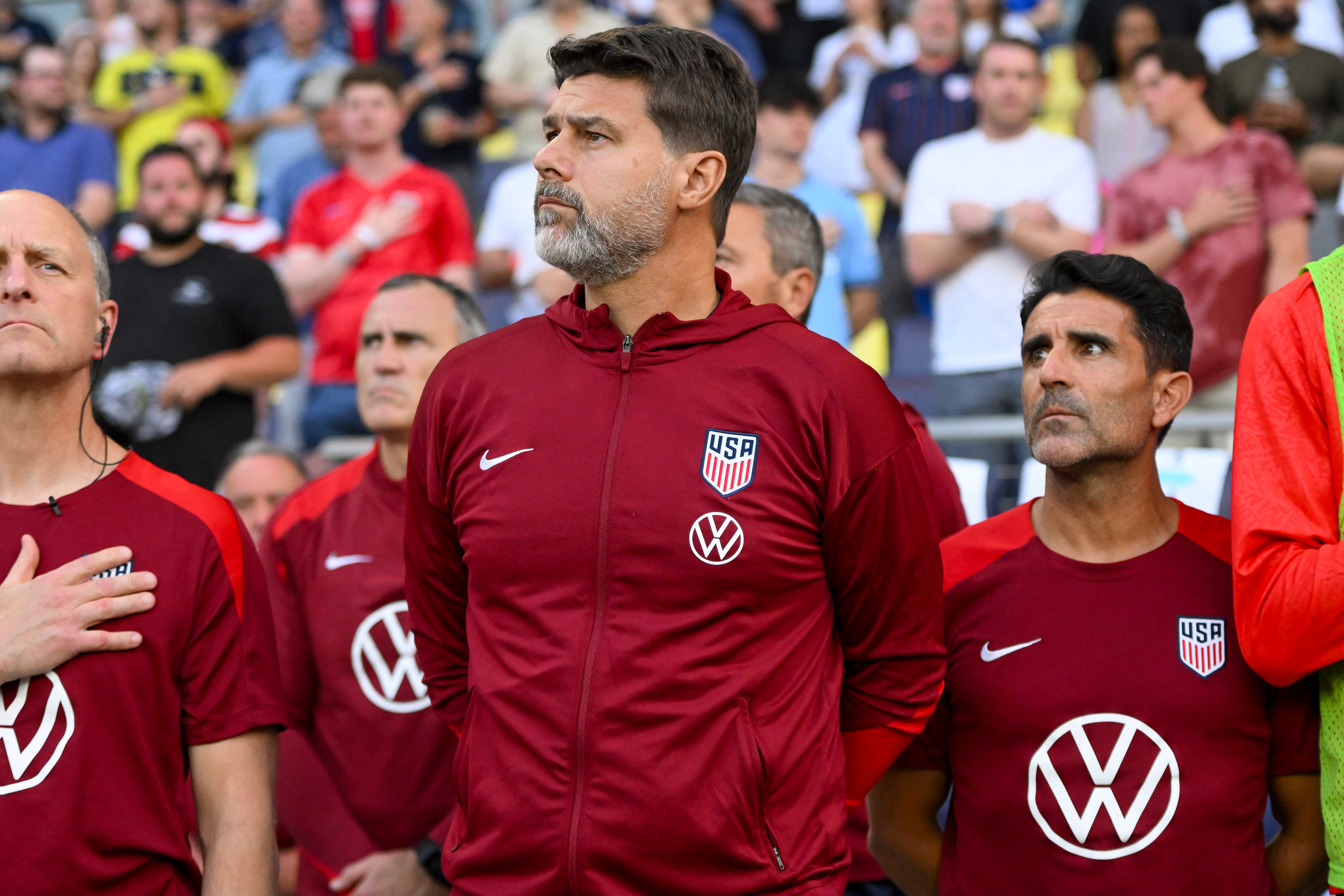 Jun 10, 2025; Nashville, Tennessee, USA; United States head coach Mauricio Pochettino stands during the anthem against the Switzerland during the first at Geodis Park. Mandatory Credit: Steve Roberts-Imagn Images
