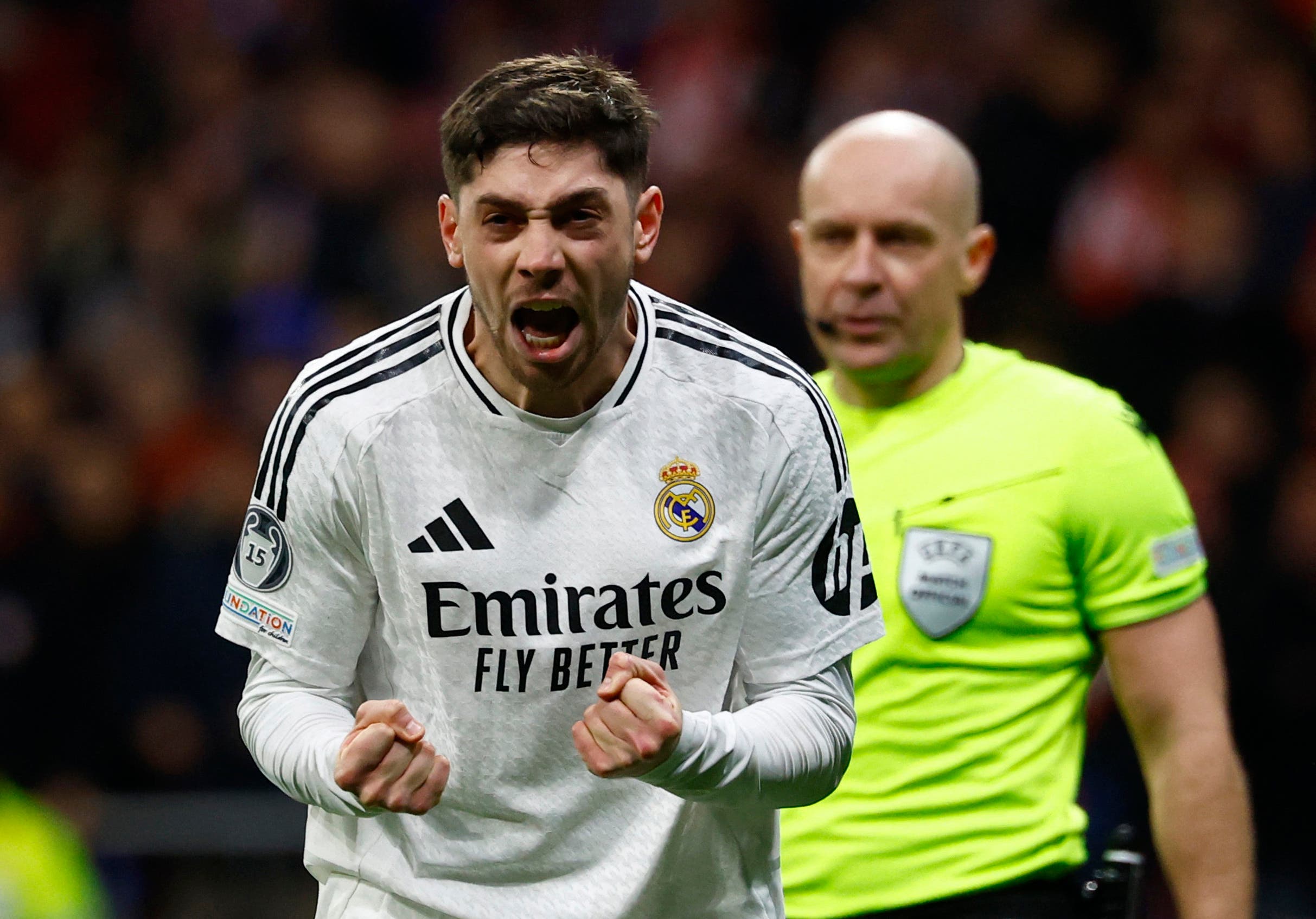 Soccer Football - Champions League - Round of 16 - Second Leg - Atletico Madrid v Real Madrid - Metropolitano, Madrid, Spain - March 12, 2025 Real Madrid's Federico Valverde celebrates scoring a penalty during the penalty shootout REUTERS/Susana Vera