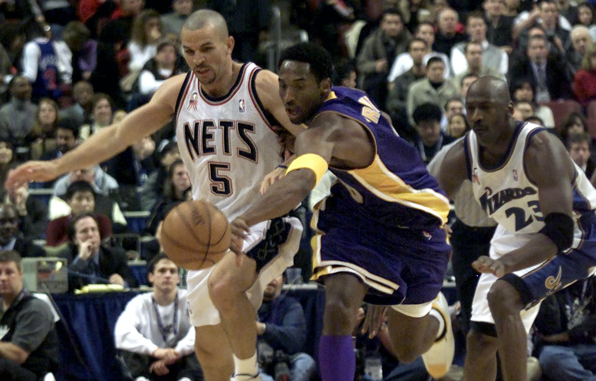 Brooklyn Nets' Jason Kidd at All-Star NBA Game with Lakers' Kobe Bryant and Wizards' Michael Jordan.