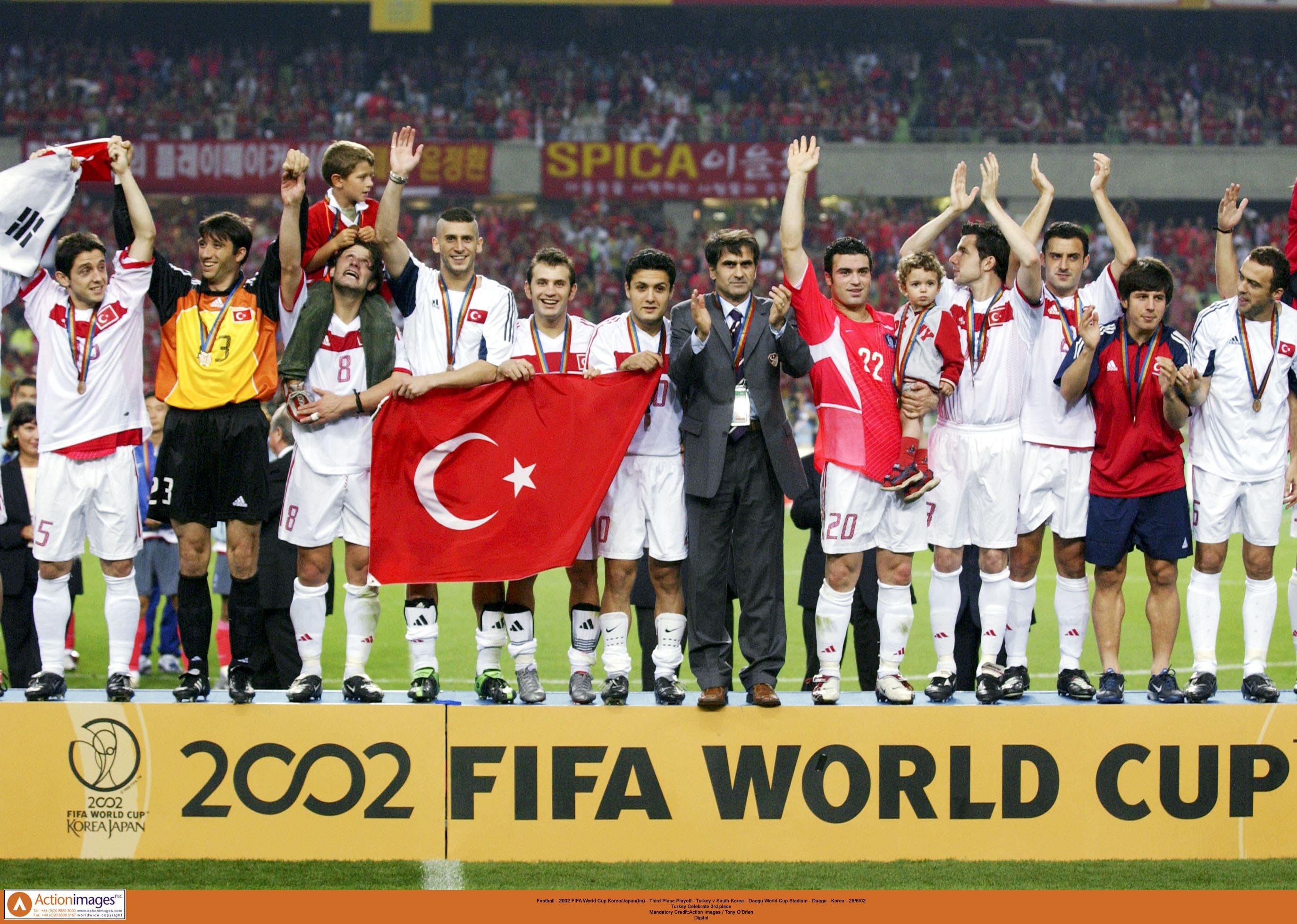 Football - 2002 FIFA World Cup Korea/Japan(tm) - Third Place Playoff - Turkey v South Korea - Daegu World Cup Stadium - Daegu - Korea - 29/6/02 Turkey Celebrate 3rd place Mandatory Credit:Action Images / Tony O'Brien Digital

