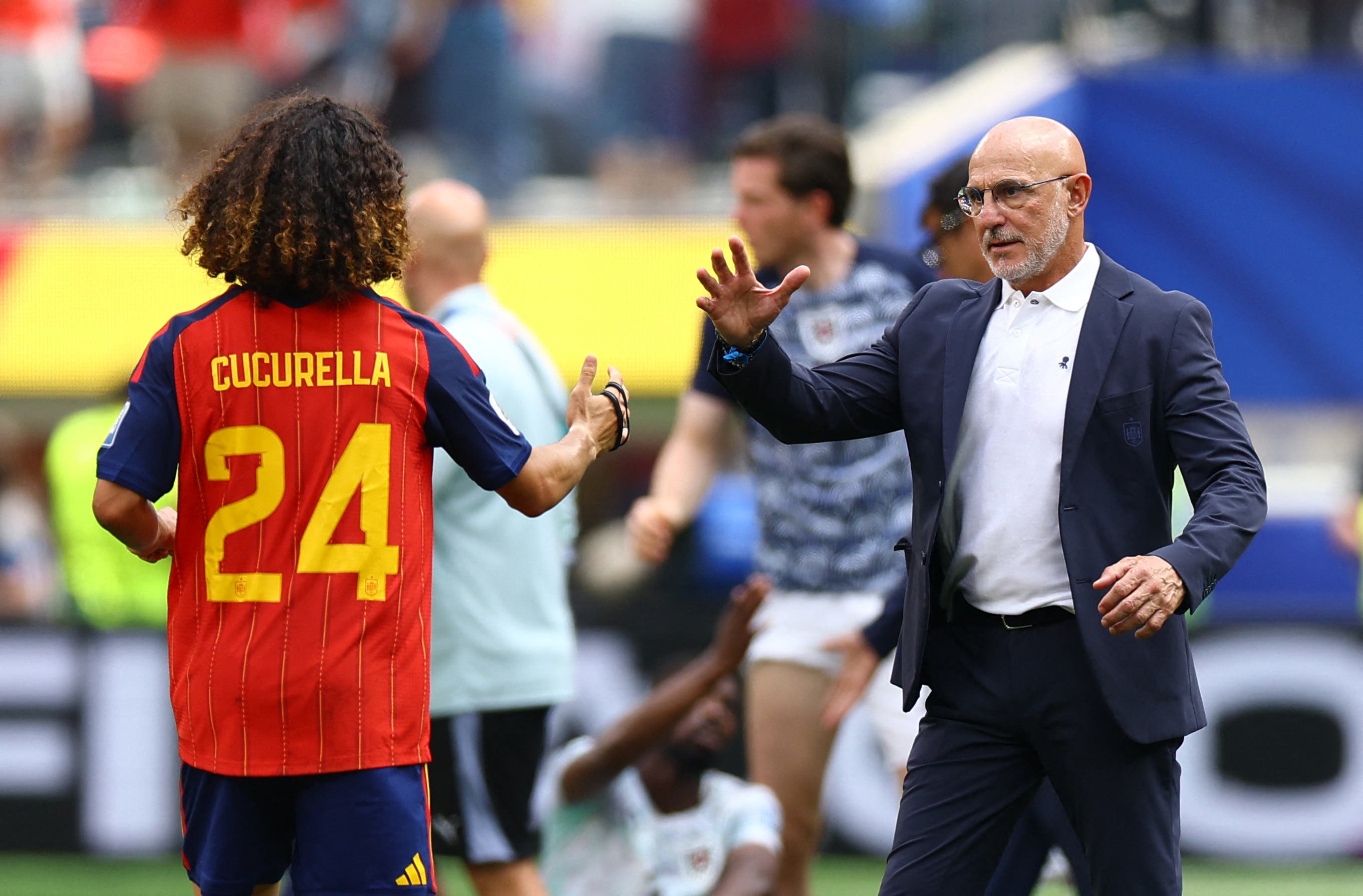 Soccer Football - FIFA World Cup 2026 - Round of 32 - Spain v Austria - Los Angeles Stadium, Inglewood, California, U.S. - July 2, 2026 Spain's Marc Cucurella and coach Luis De La Fuente celebrates after the match as Spain qualify for the Round of 16 stage of the World Cup REUTERS/Lisi Niesner
