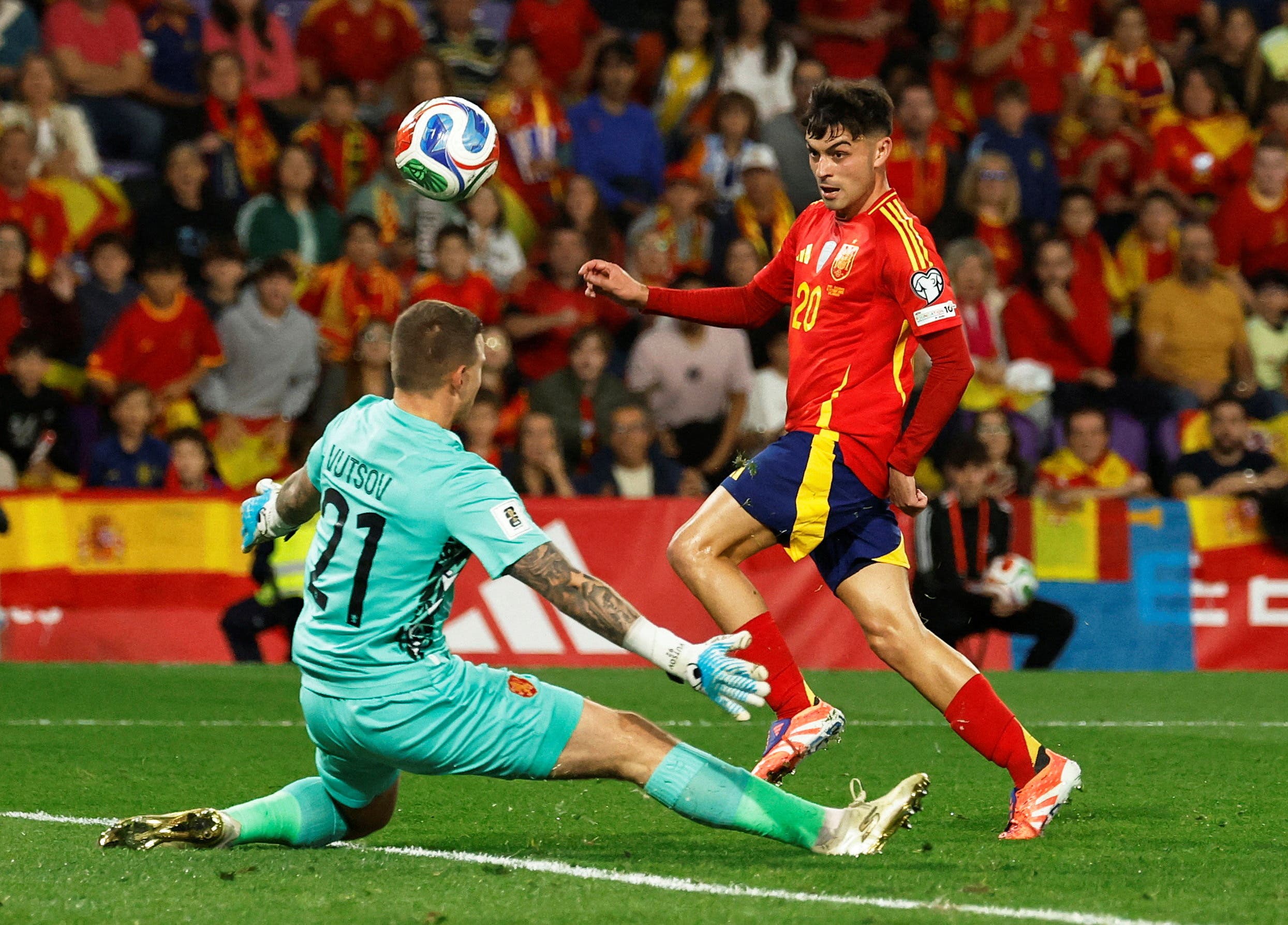 FILE PHOTO: Soccer Football - FIFA World Cup - UEFA Qualifiers - Group E - Spain v Bulgaria - Estadio Jose Zorrilla, Valladolid, Spain - October 14, 2025 Bulgaria's Svetoslav Vutsov in action as Spain's Pedri shoots at goal REUTERS/Susana Vera/File Photo