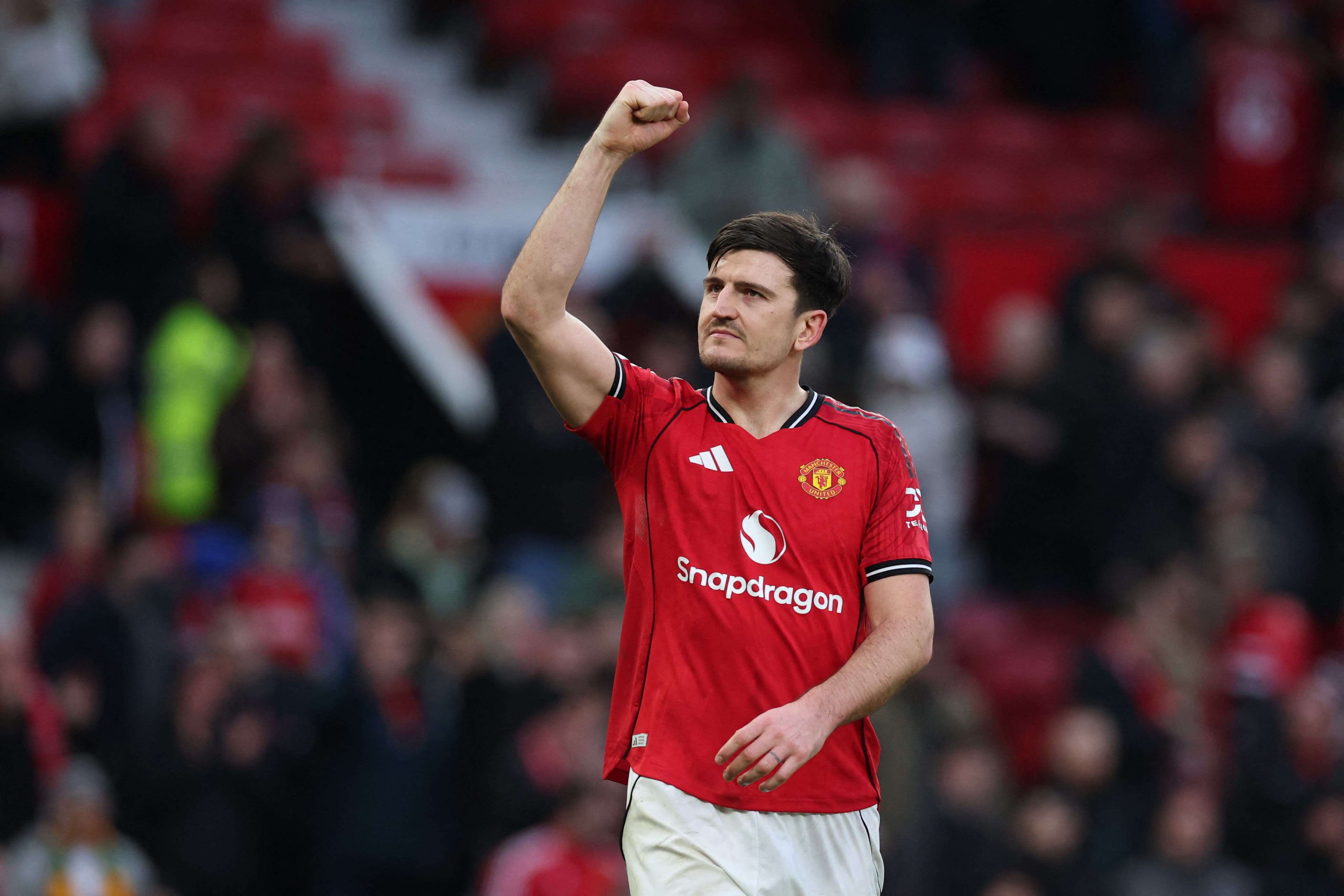 Soccer Football - Premier League - Manchester United v Fulham - Old Trafford, Manchester, Britain - February 1, 2026 Manchester United's Harry Maguire celebrates after the match REUTERS/Phil Noble