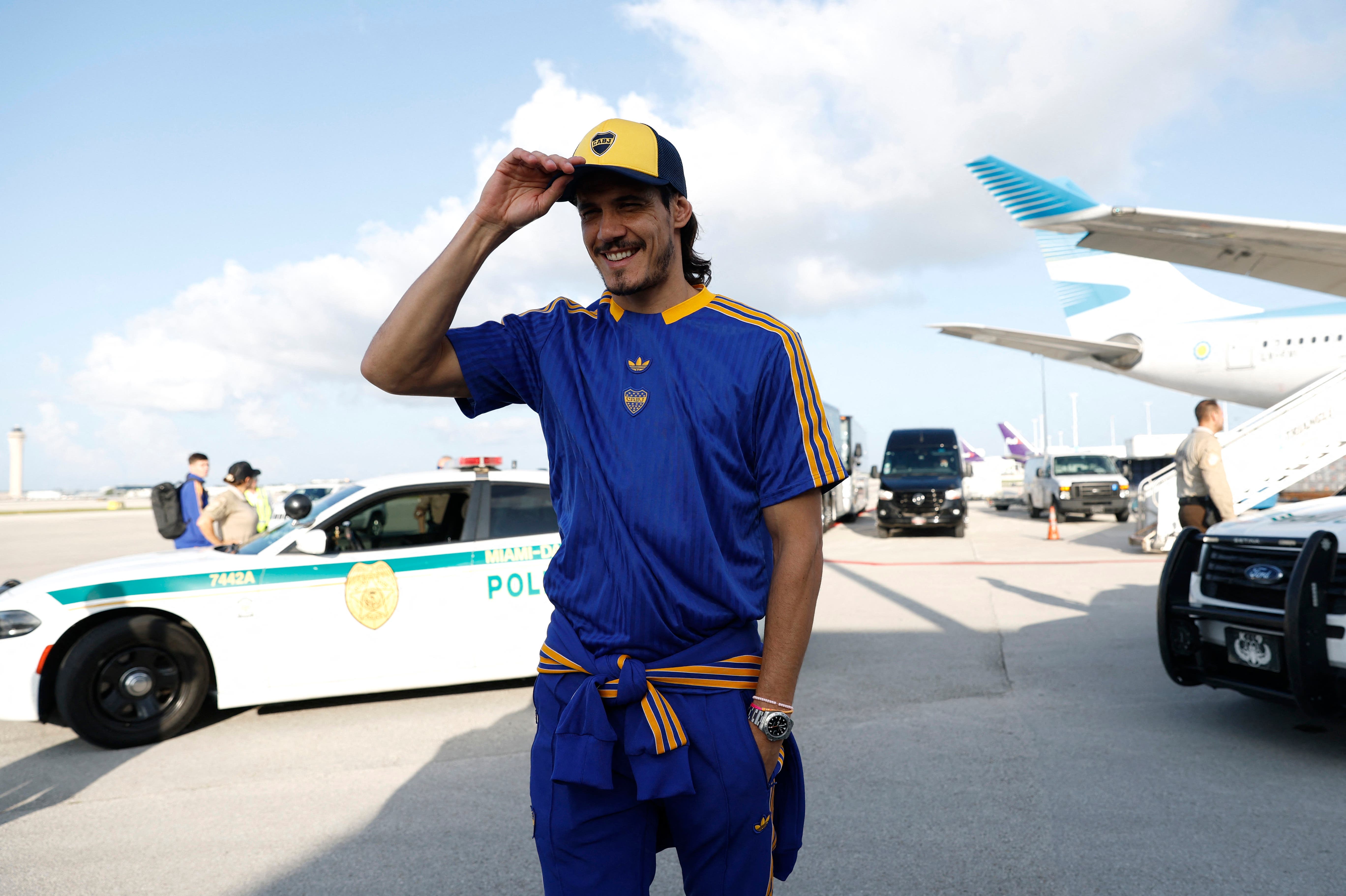 Boca Juniors' Edinson Cavani arrives at the Miami International Airport