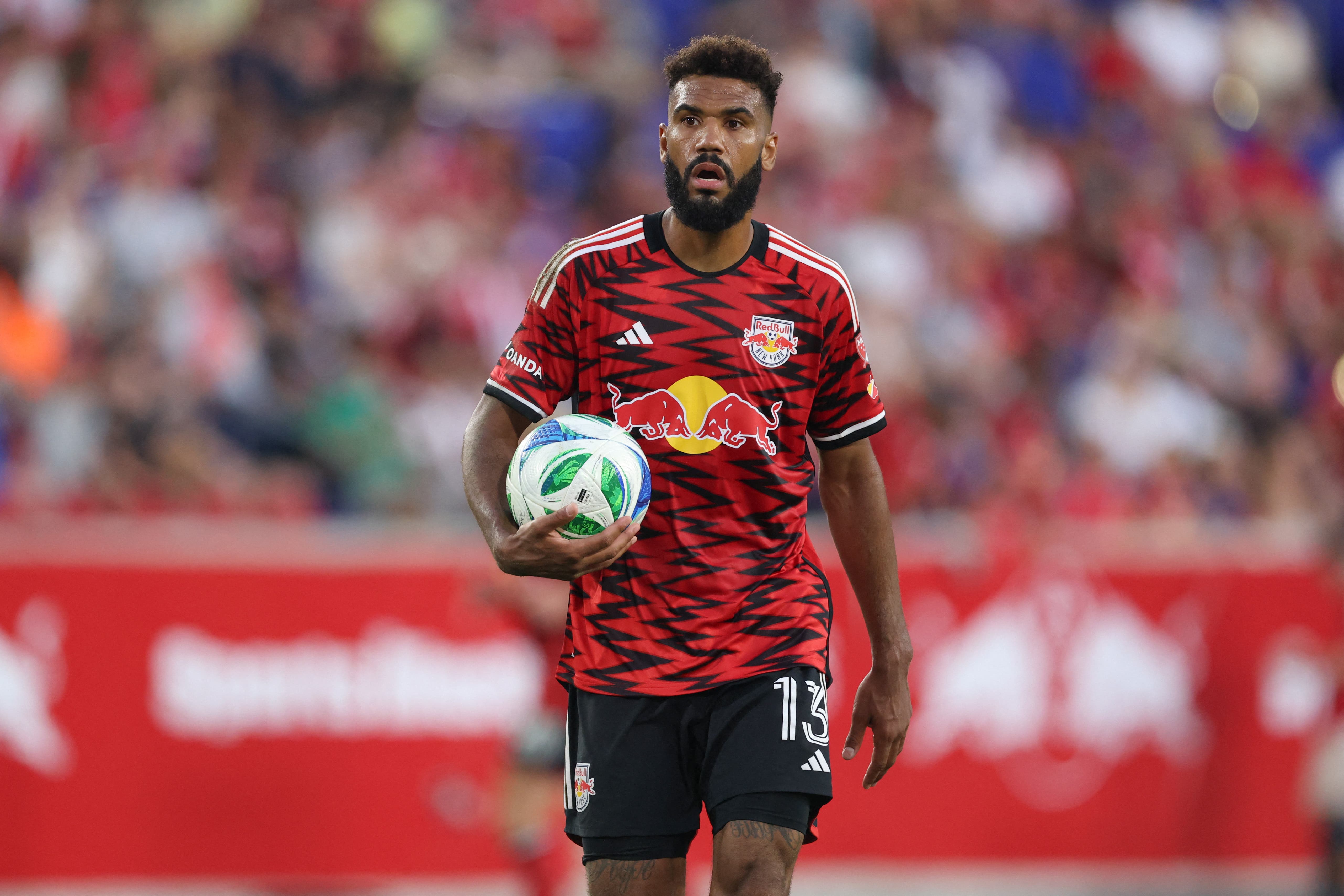 Aug 10, 2025; Harrison, New Jersey, USA; New York Red Bulls forward Eric Maxim Choupo-Moting (13) walks the ball to the penalty spot during the second half against Real Salt Lake at Sports Illustrated Stadium. Mandatory Credit: Vincent Carchietta-Imagn Images