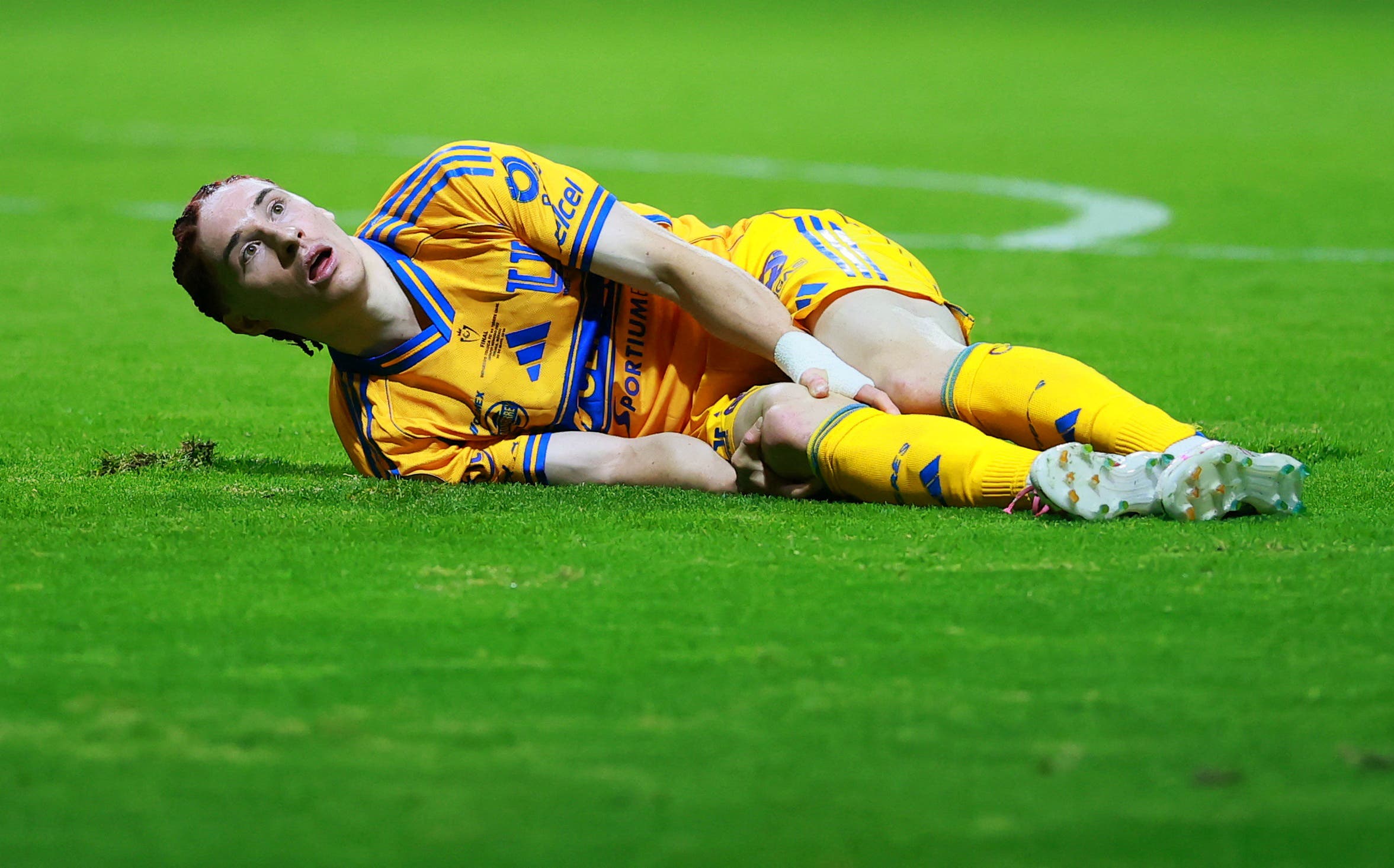Soccer Football - CONCACAF Champions Cup - Final - Toluca v Tigres UANL - Estadio Nemesio Diez, Toluca, Mexico - May 30, 2026 Tigres UANL's Marcelo Flores reacts after sustaining an injury REUTERS/Eloisa Sanchez