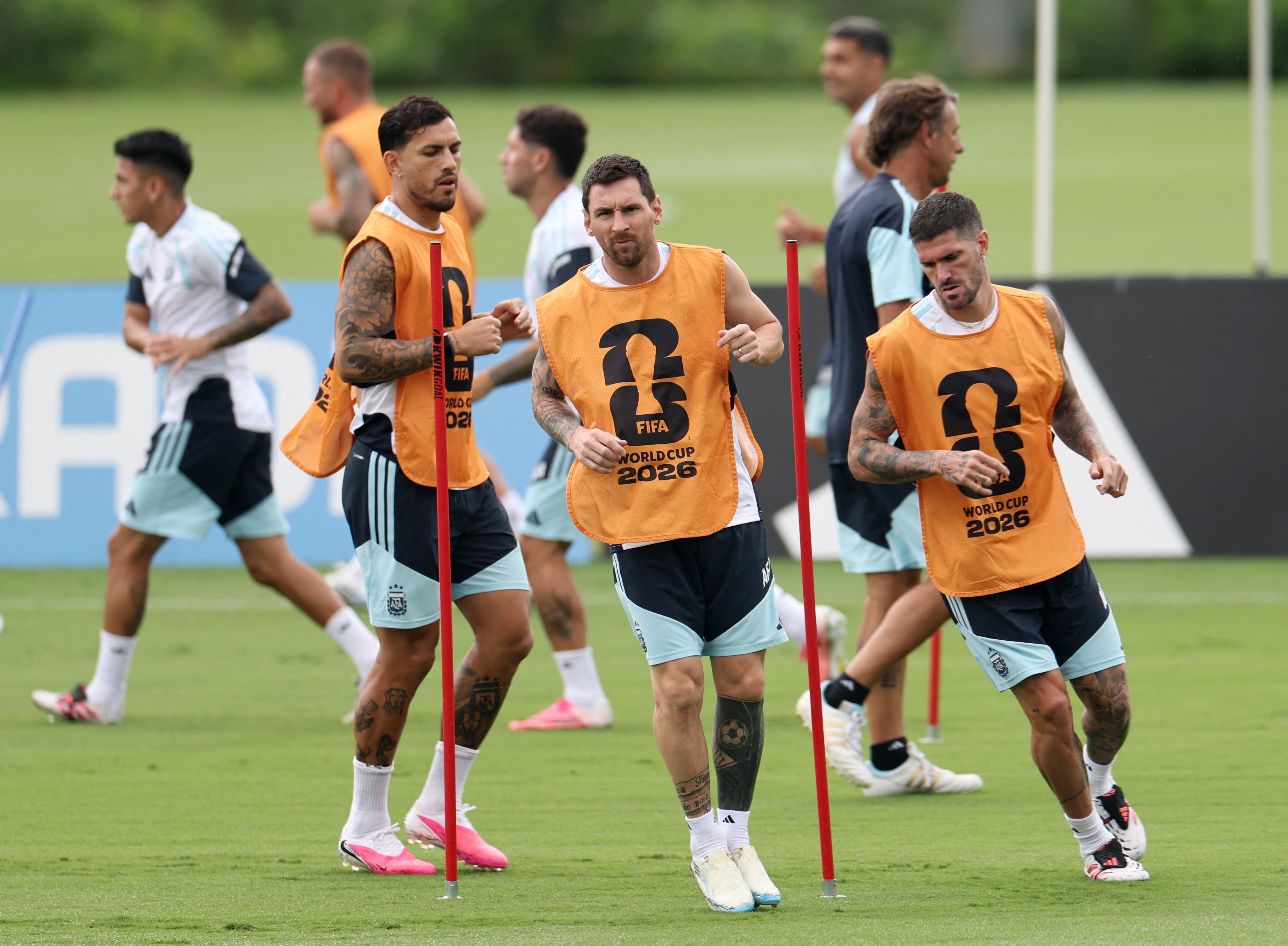Soccer Football - FIFA World Cup 2026 - Argentina Training - Atlanta United Training Centre, Marietta, Georgia - July 14, 2026 Argentina's Leandro Paredes, Rodrigo De Paul and Lionel Messi during training REUTERS/Amanda Perobelli