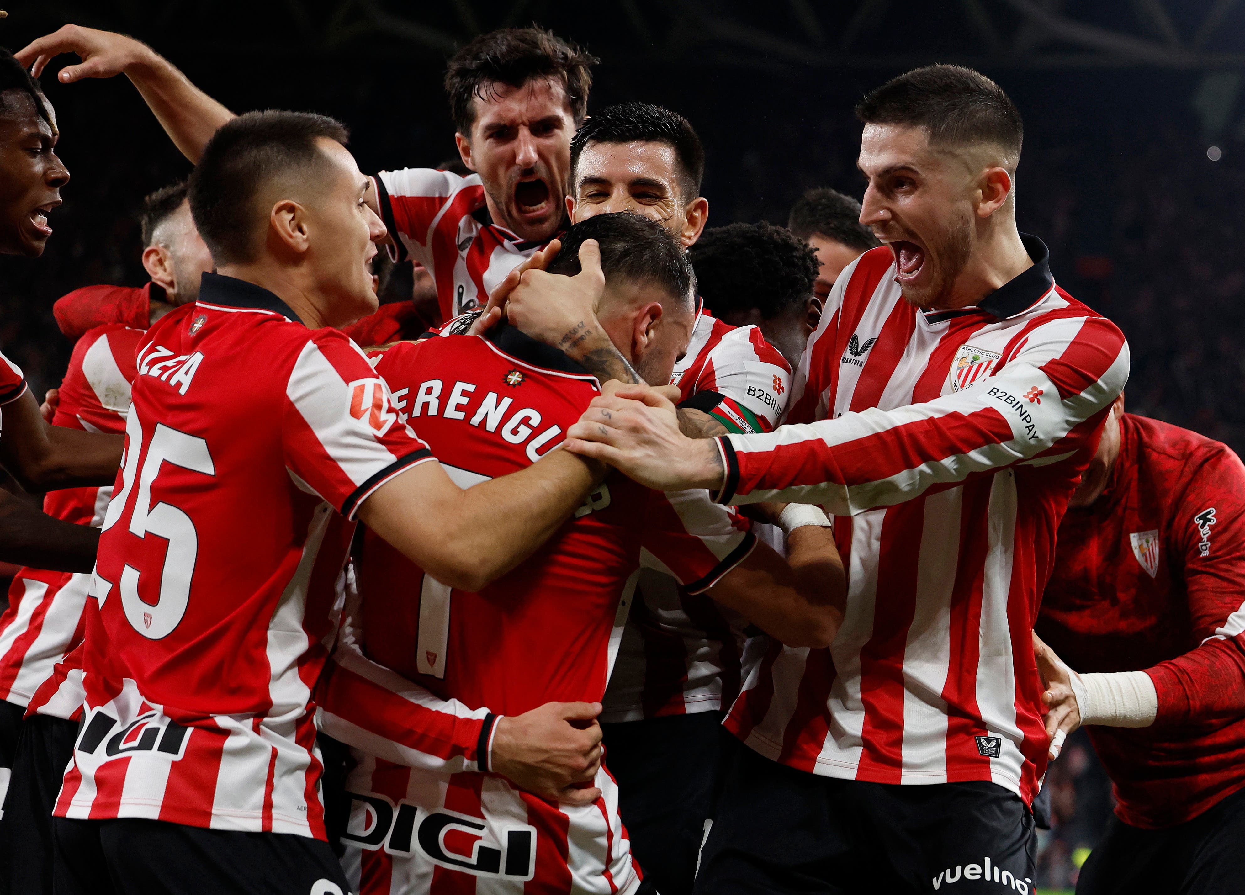 Soccer Football - LaLiga - Athletic Bilbao v Atletico Madrid - San Mames, Bilbao, Spain - December 6, 2025 Athletic Bilbao's Alex Berenguer celebrates scoring their first goal with teammates REUTERS/Vincent West