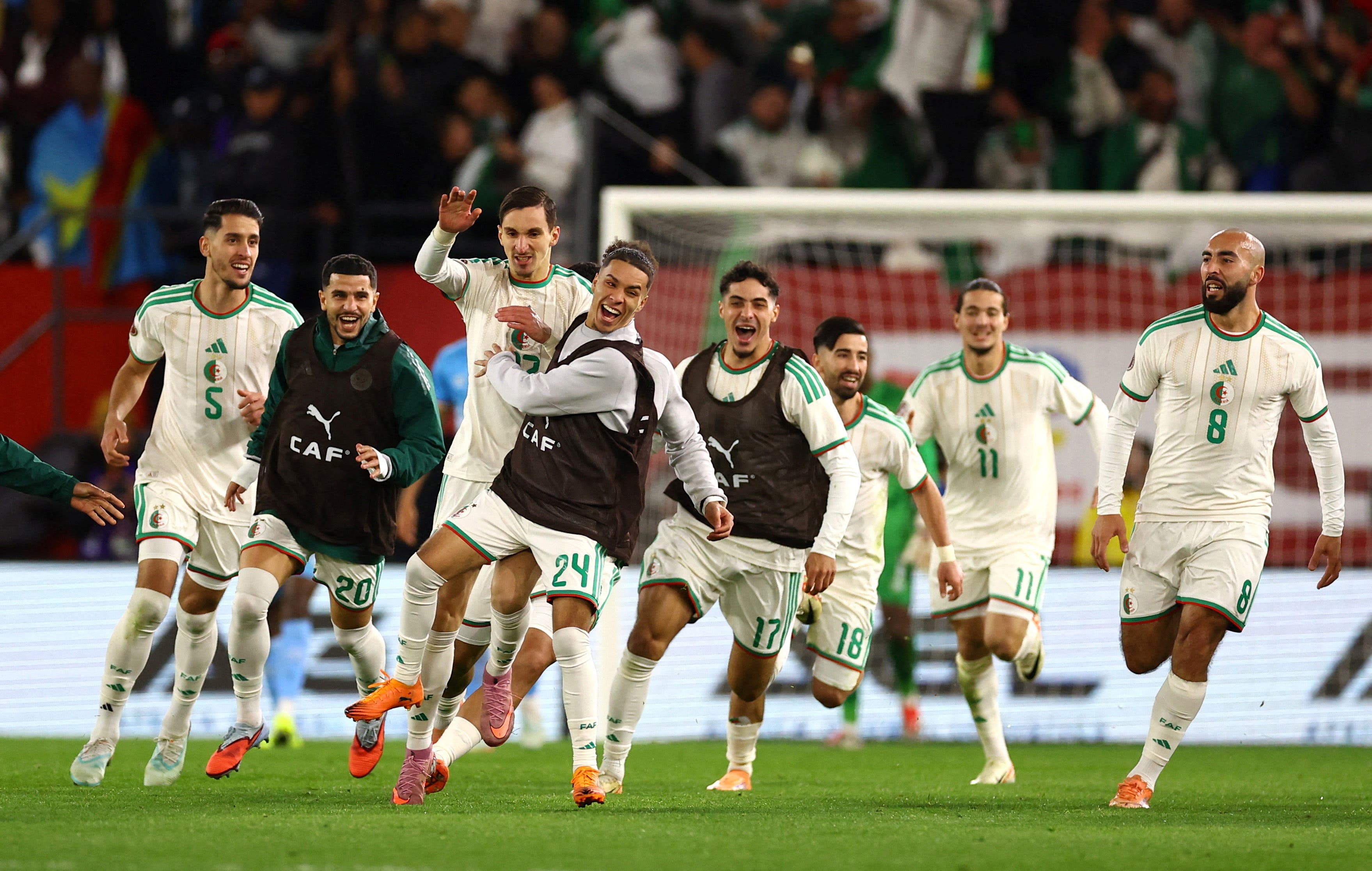 Soccer Football - CAF Africa Cup of Nations - Morocco 2025 - Round of 16 - Algeria v Democratic Republic of Congo - Moulay El Hassan Stadium, Rabat, Morocco - January 6, 2026 Algeria's Adil Boulbina celebrates scoring their first goal with teammates in the extra time REUTERS/Siphiwe Sibeko TPX IMAGES OF THE DAY