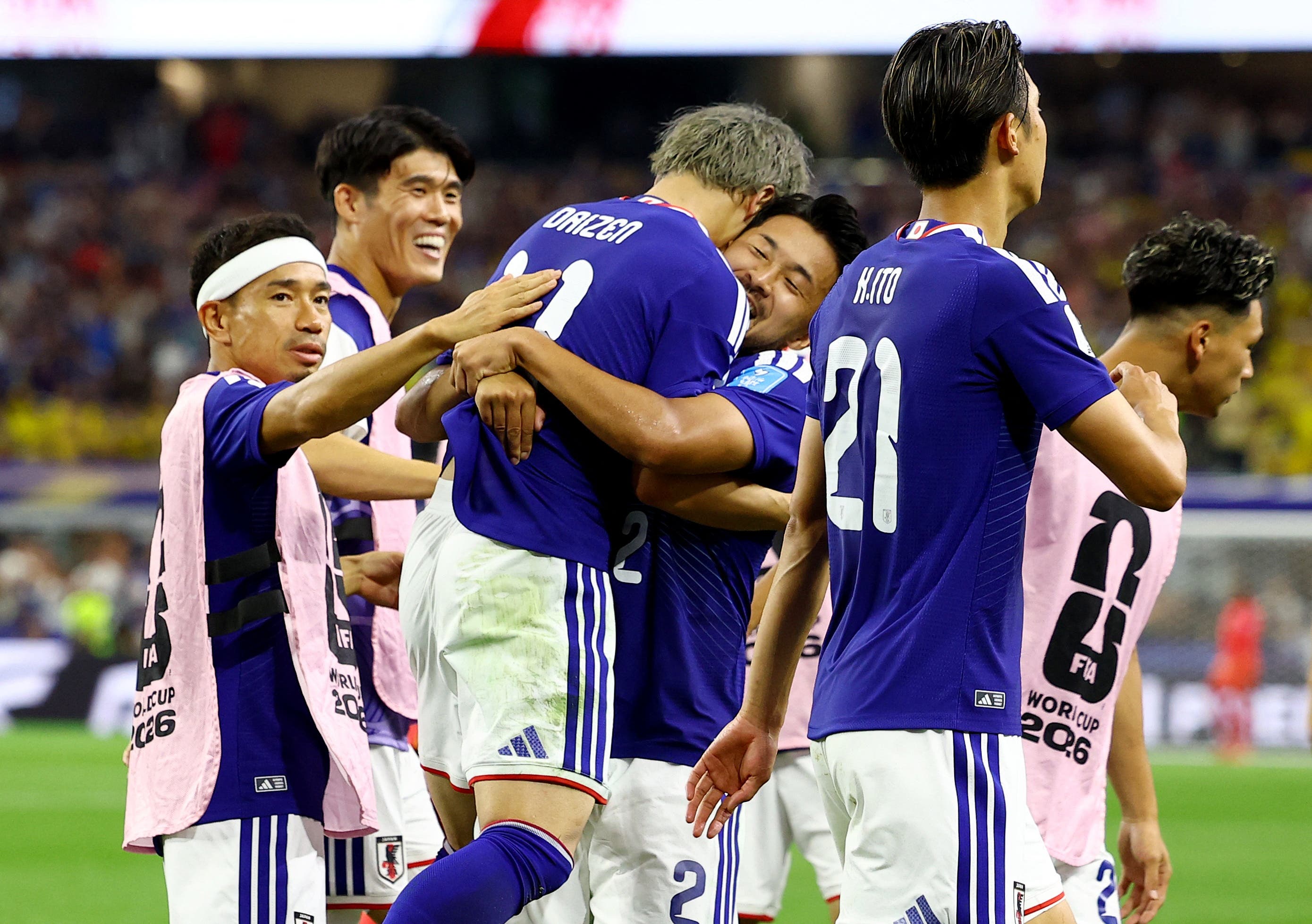 Soccer Football - FIFA World Cup 2026 - Group F - Japan v Sweden - Dallas Stadium, Arlington, Texas, U.S. - June 25, 2026 Japan's Daizen Maeda celebrates scoring their first goal with Yukinari Sugawara, Yuto Nagatomo and teammates REUTERS/Issei Kato