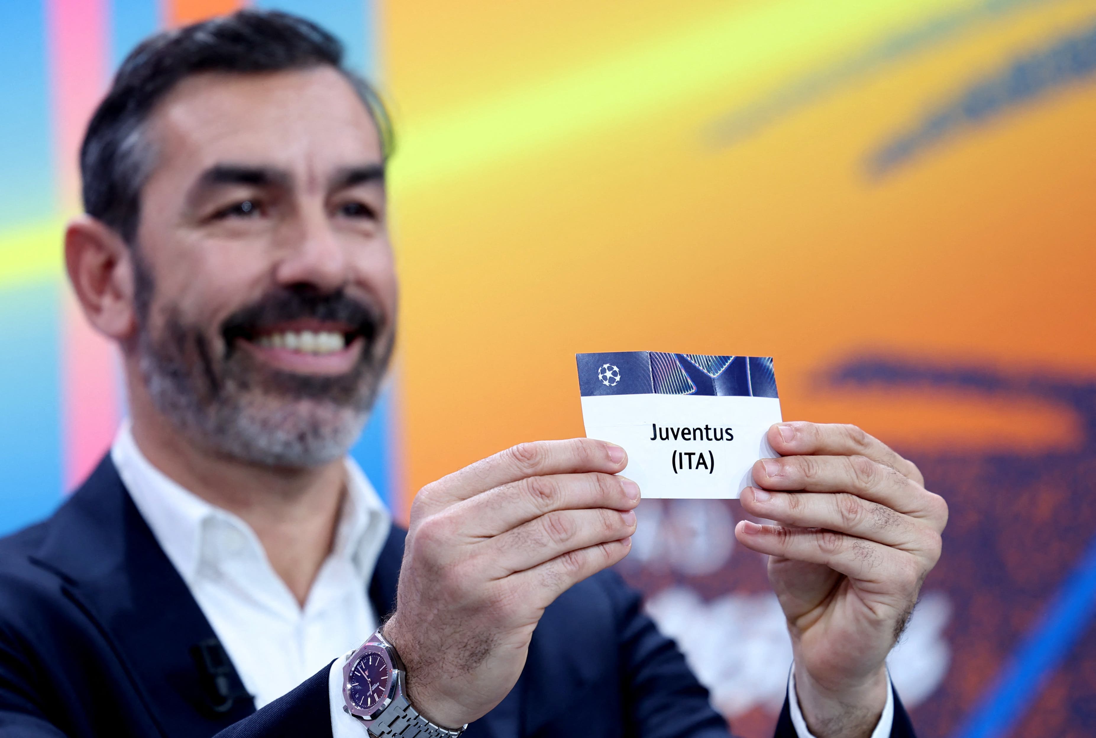 Soccer Football - UEFA Champions League - Knockout Phase Playoffs Draw - UEFA Headquarters, Nyon, Switzerland - January 30, 2026 Former player Robert Pires draws Juventus REUTERS/Pierre Albouy