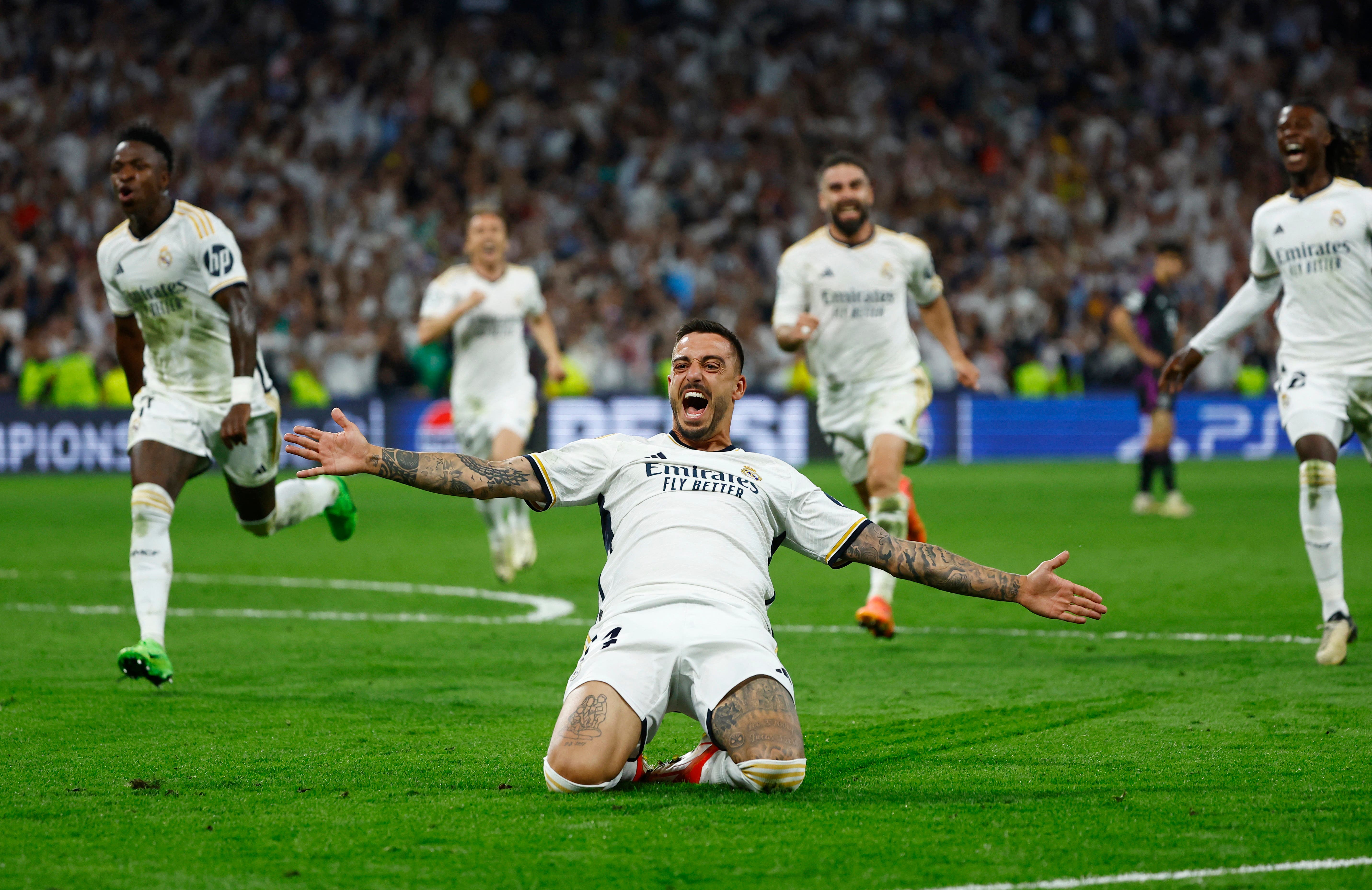 Real Madrid's Joselu celebrates scoring their second goal 