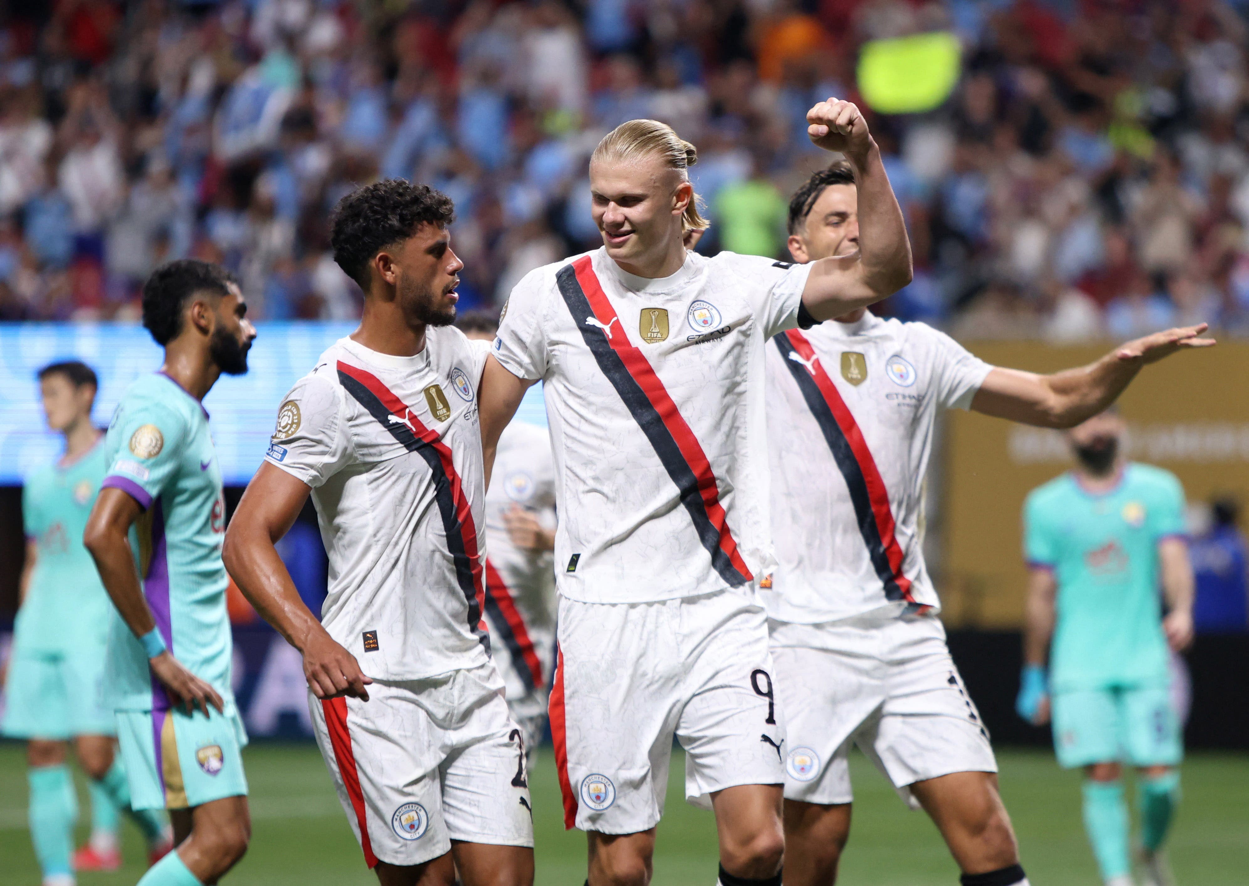 Manchester City's Erling Haaland celebrates scoring their third goal 