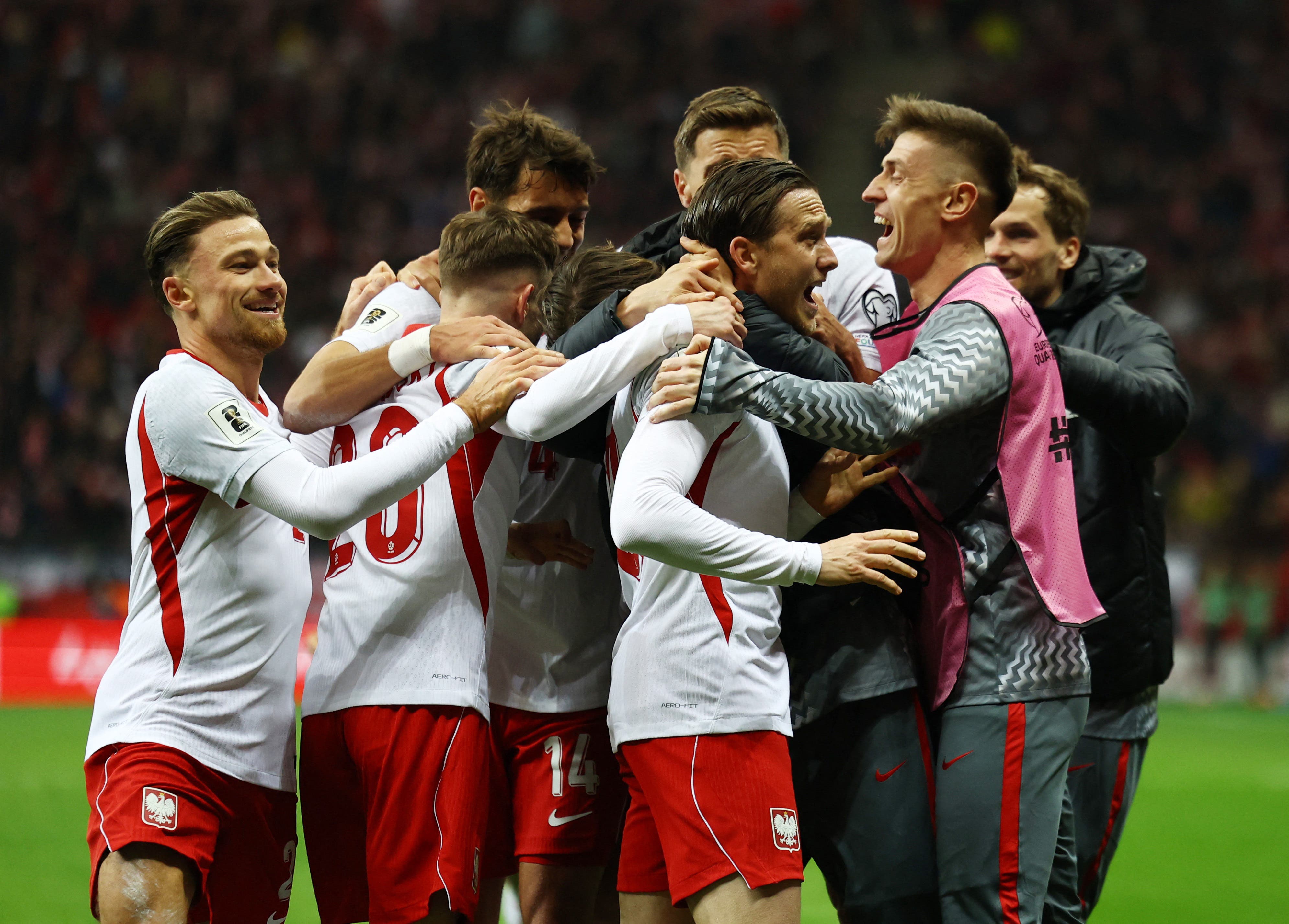 Soccer Football - FIFA World Cup - UEFA Qualifiers - Semi Final - Poland v Albania - PGE Narodowy, Warsaw, Poland - March 26, 2026 Poland's Piotr Zielinski celebrates scoring their second goal with teammates REUTERS/Kacper Pempel