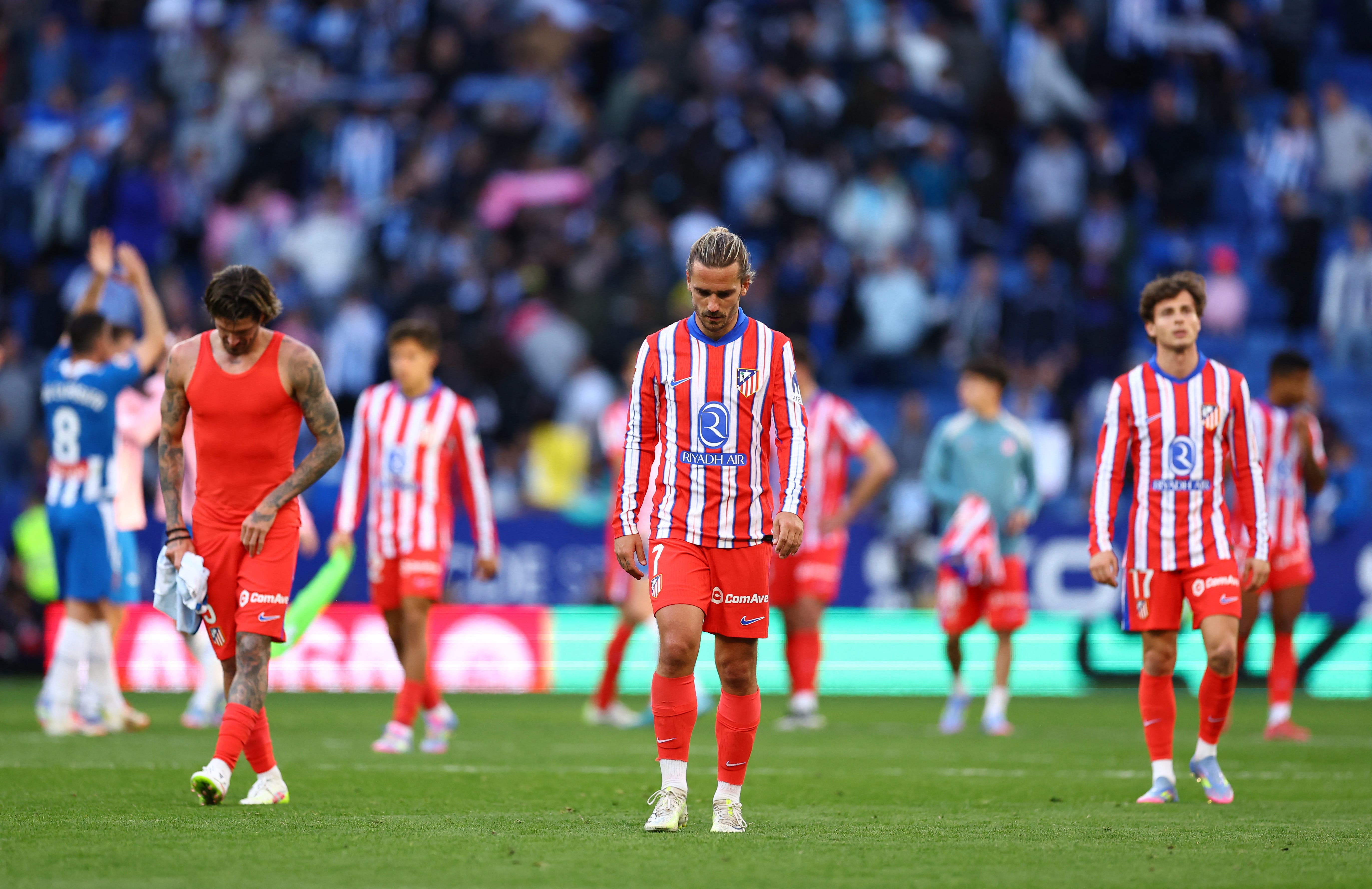 Atletico Madrid's Antoine Griezmann looks dejected after the match