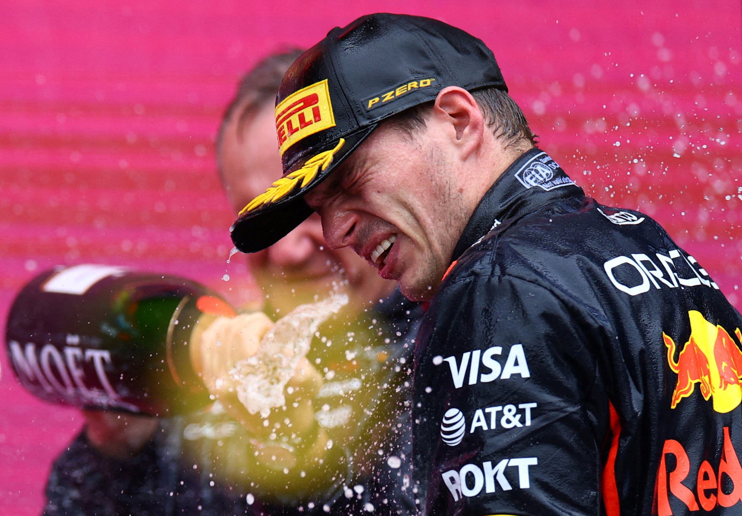 Formula One F1 - Azerbaijan Grand Prix - Baku City Circuit, Baku, Azerbaijan - September 21, 2025 Red Bull's Max Verstappen celebrates on the podium after winning the Azerbaijan Grand Prix with Red Bull Chief Engineer Paul Monaghan REUTERS/Lisi Niesner 