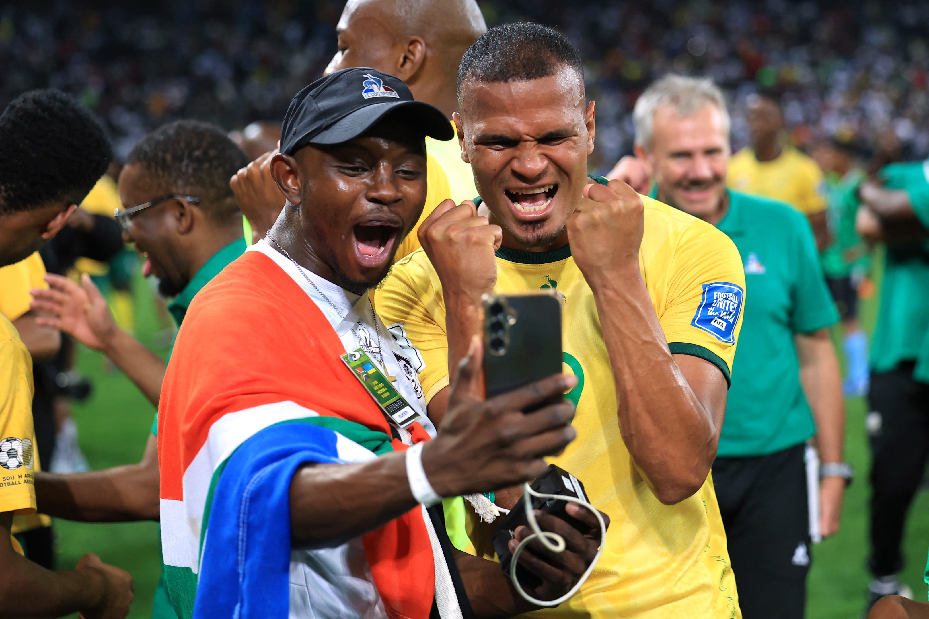 Soccer Football - FIFA World Cup - CAF Qualifiers - Group C - South Africa v Rwanda - Mbombela Stadium, Mbombela, South Africa - October 14, 2025 South Africa's Ashley Cupido celebrates after qualifying for the FIFA World Cup REUTERS/Esa Alexander