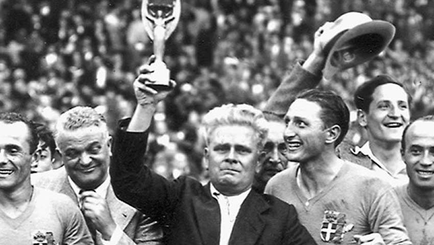 Vittorio Pozzo lifts his second World Cup Trohpy wiht the Italian National Team.